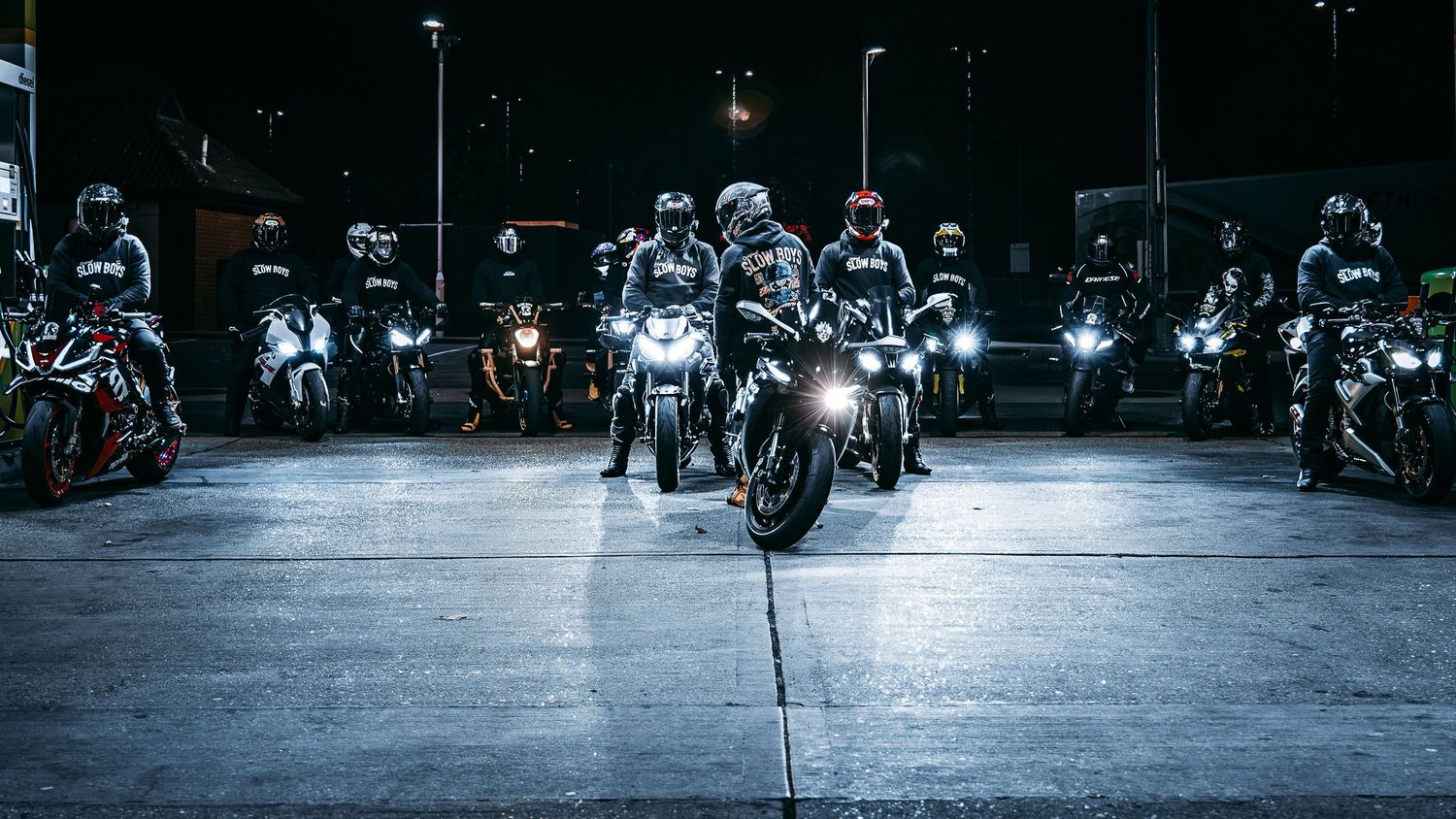 Motorcylists posing at petrol station; automotive photography in Essex