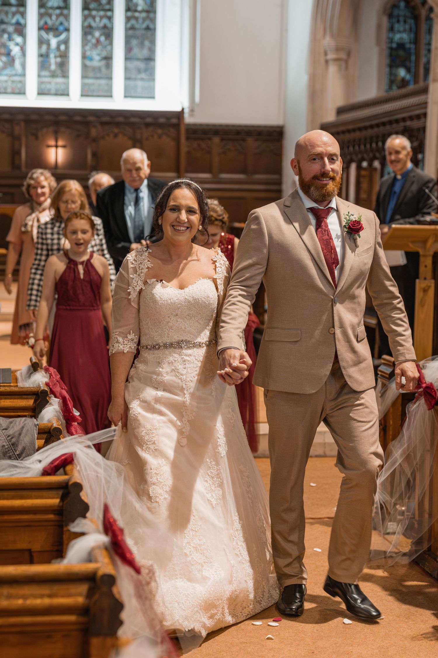 essex bride and groom walking down aisle church wedding