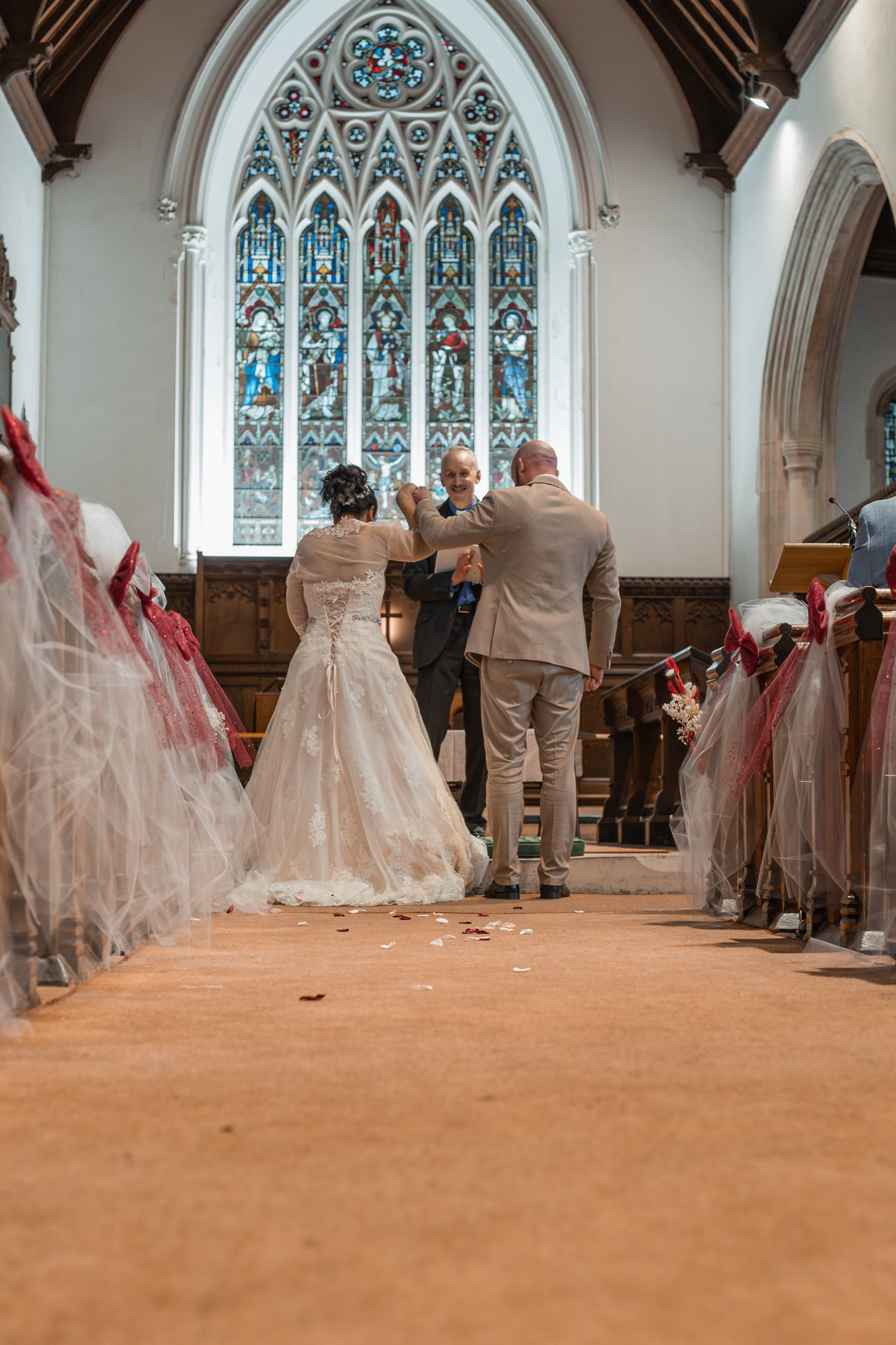 essex bride and groom walking down aisle church wedding