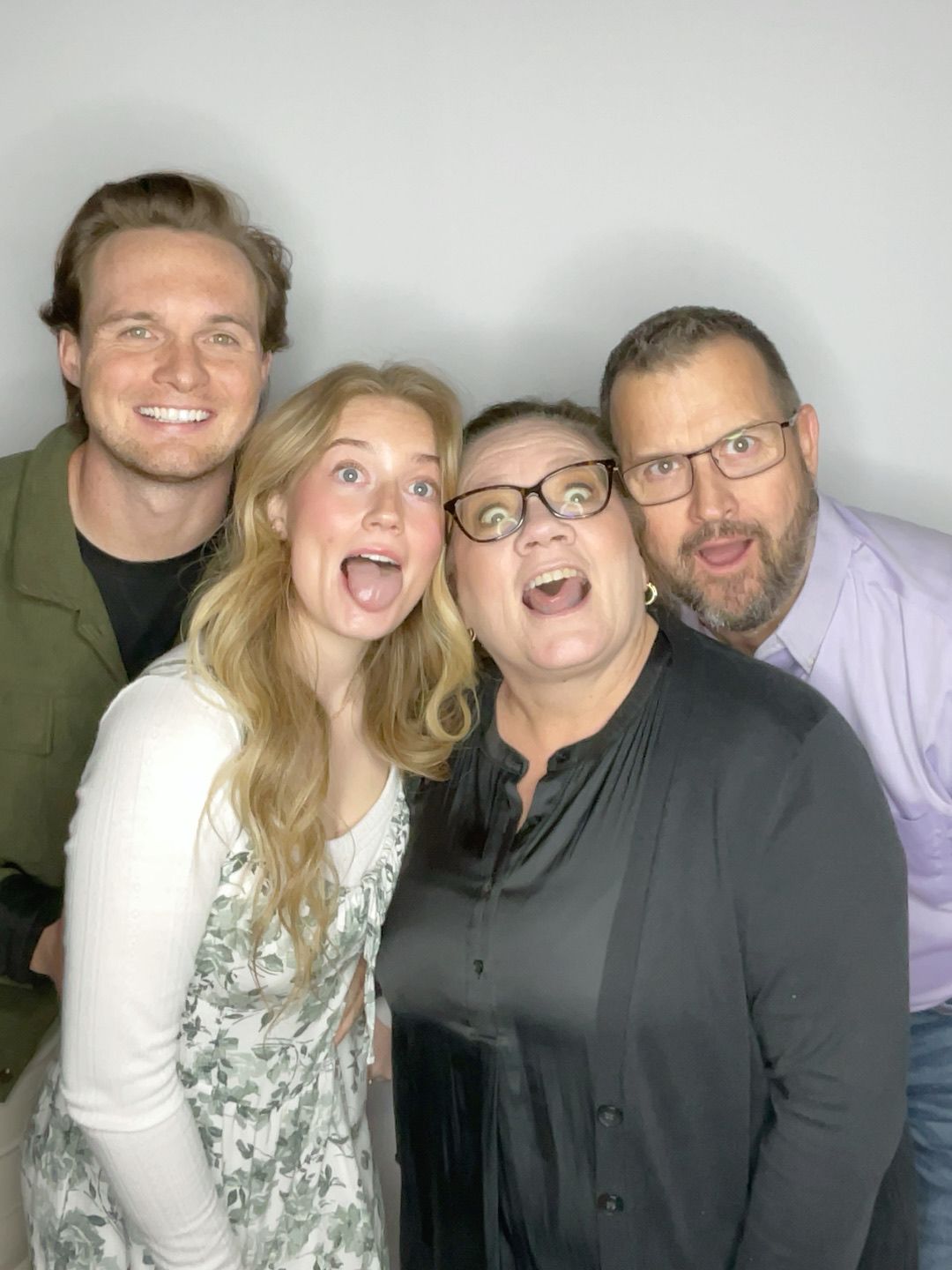 Family posing in the Twist Photo Booths photo booth at a Phoenix, AZ event