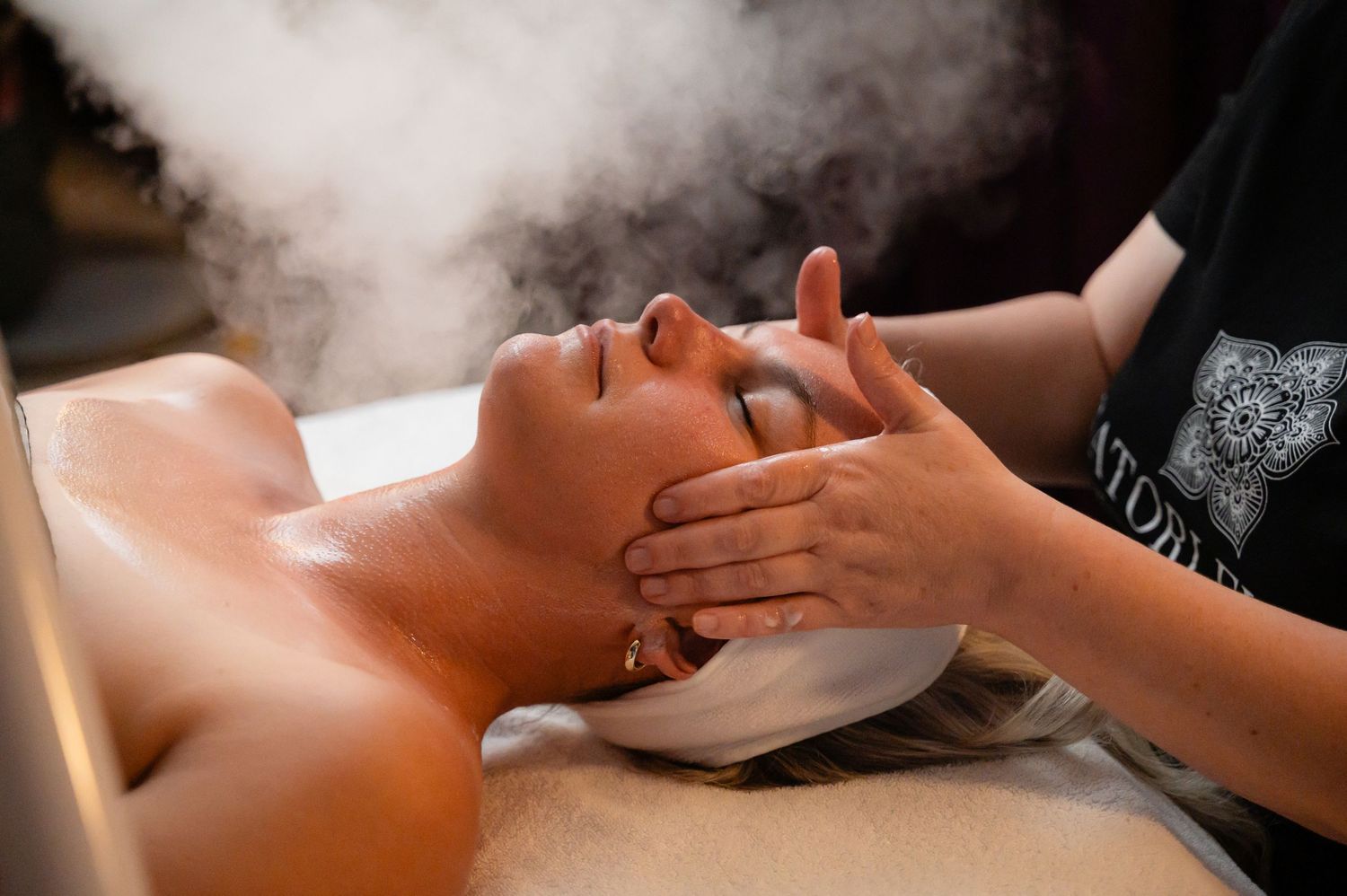 A sequence of massage therapy techniques being demonstrated on a client lying on a treatment table.