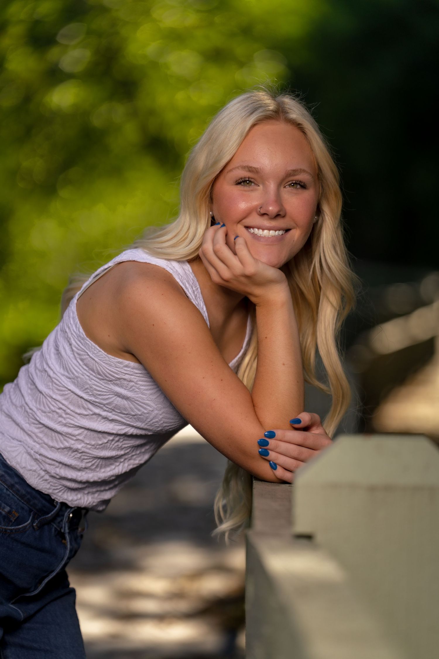 Casual outdoor portrait session featuring relaxed poses and natural lighting.
