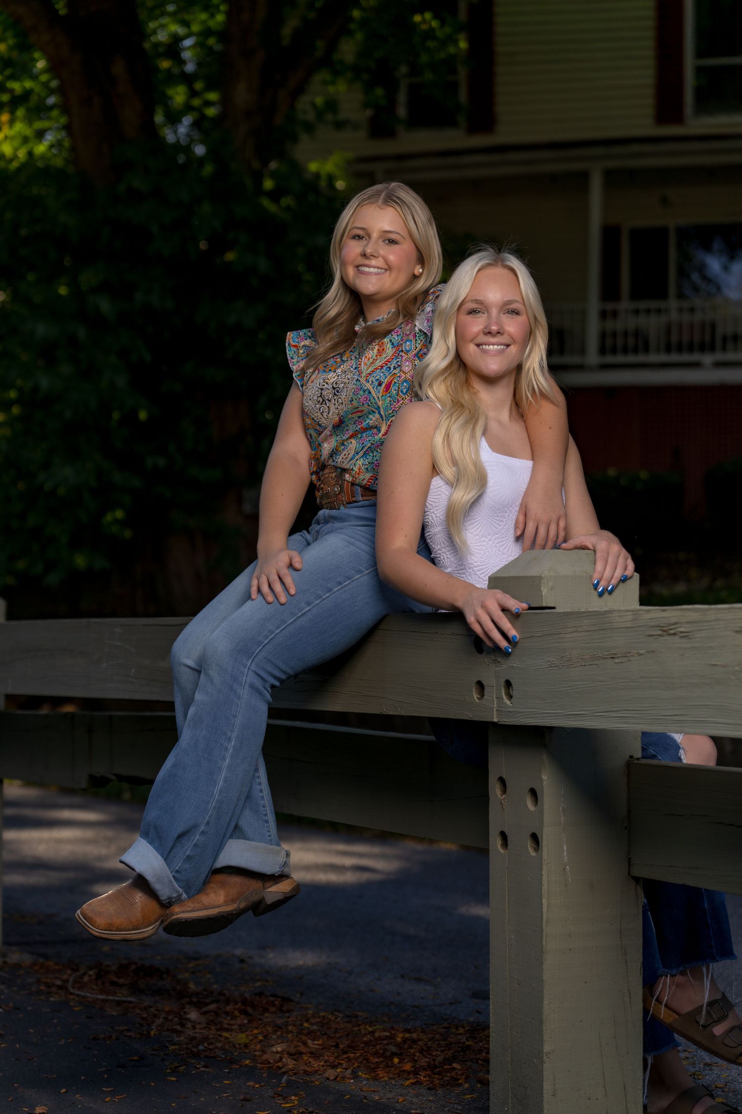 A casual outdoor portrait series showing someone sitting on a wooden railing in casual attire against a green backdrop.