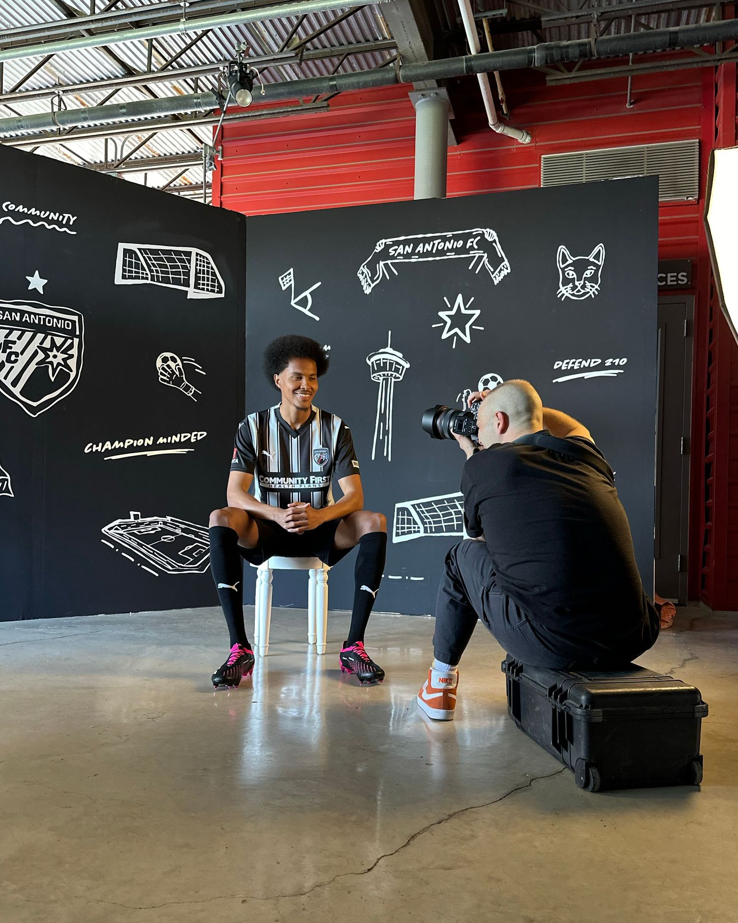 A sequence of five photos showing a person sitting against a dark wall with sports-themed illustrations and diagrams.