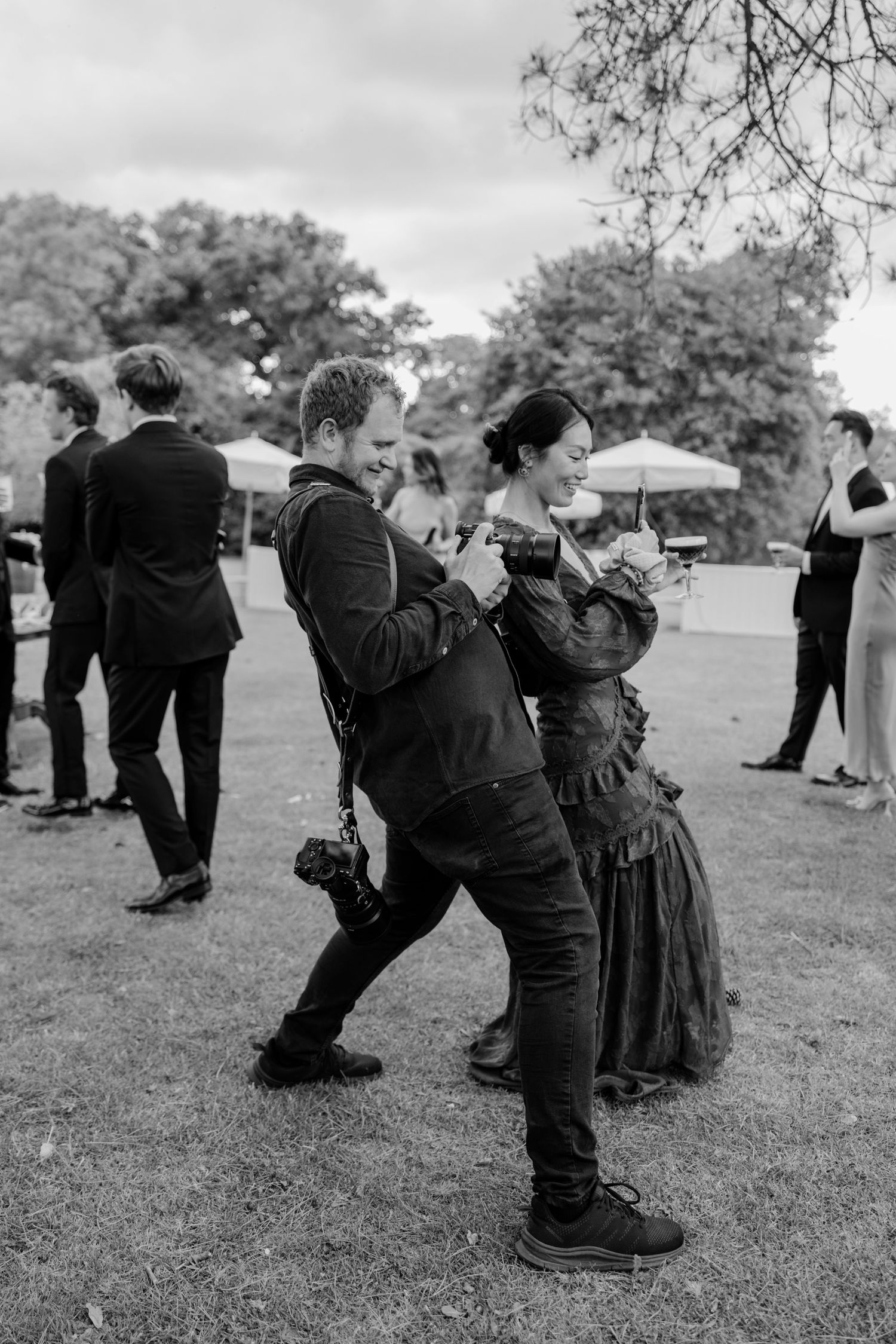 portrait of ryan goold capturing guests candidly at babington house during a wedding in somerset