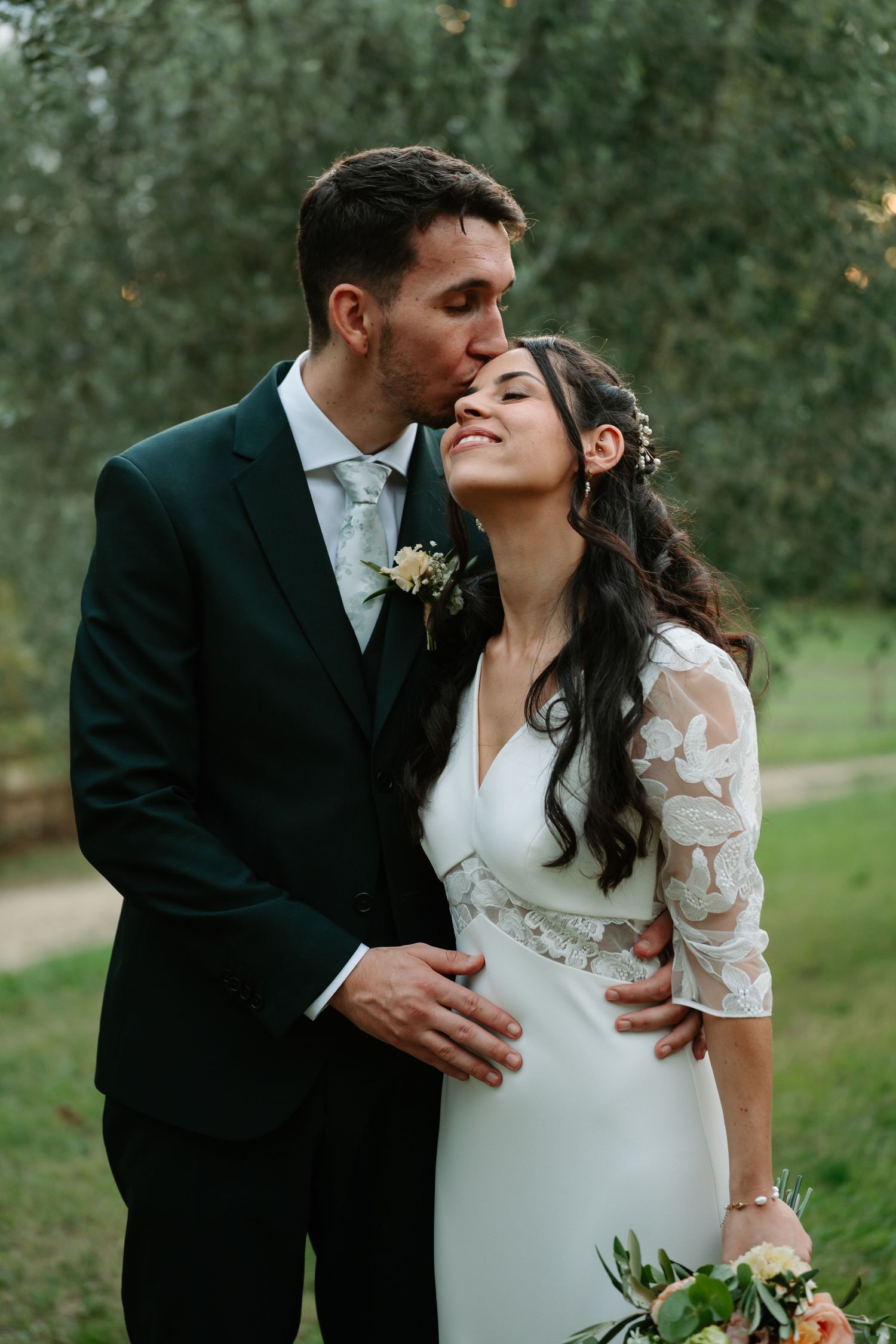 A romantic wedding couple shares tender moments outdoors in a series of intimate portraits against a natural backdrop.
