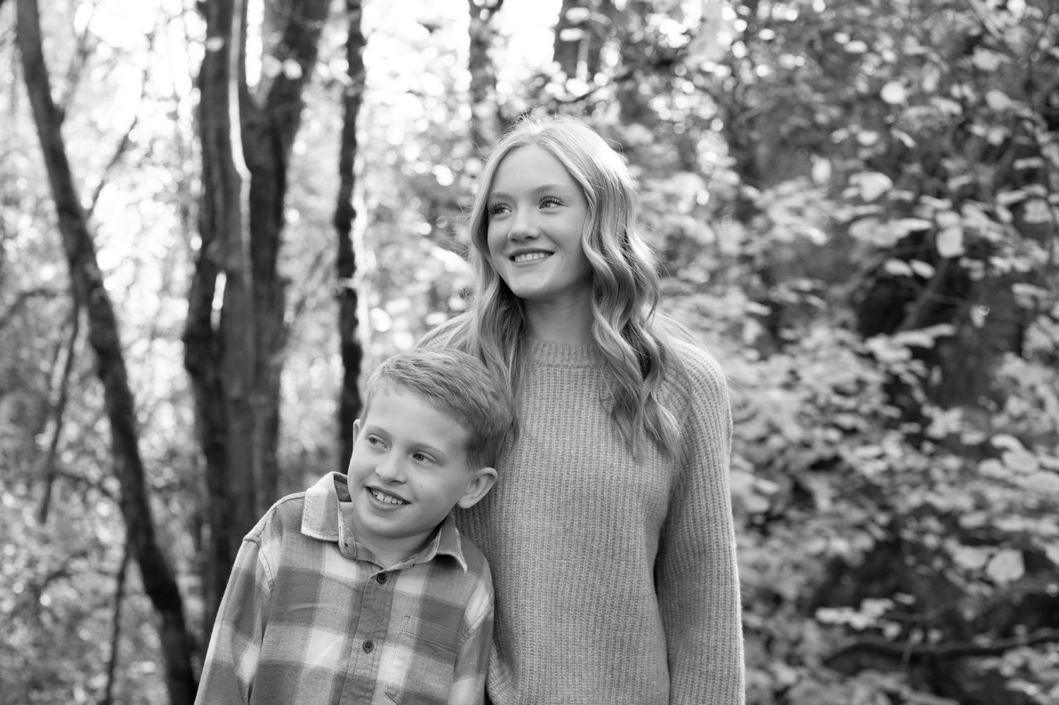 Black and white portrait captured in a natural forest setting. Family session. Portrait photography. Oregon.