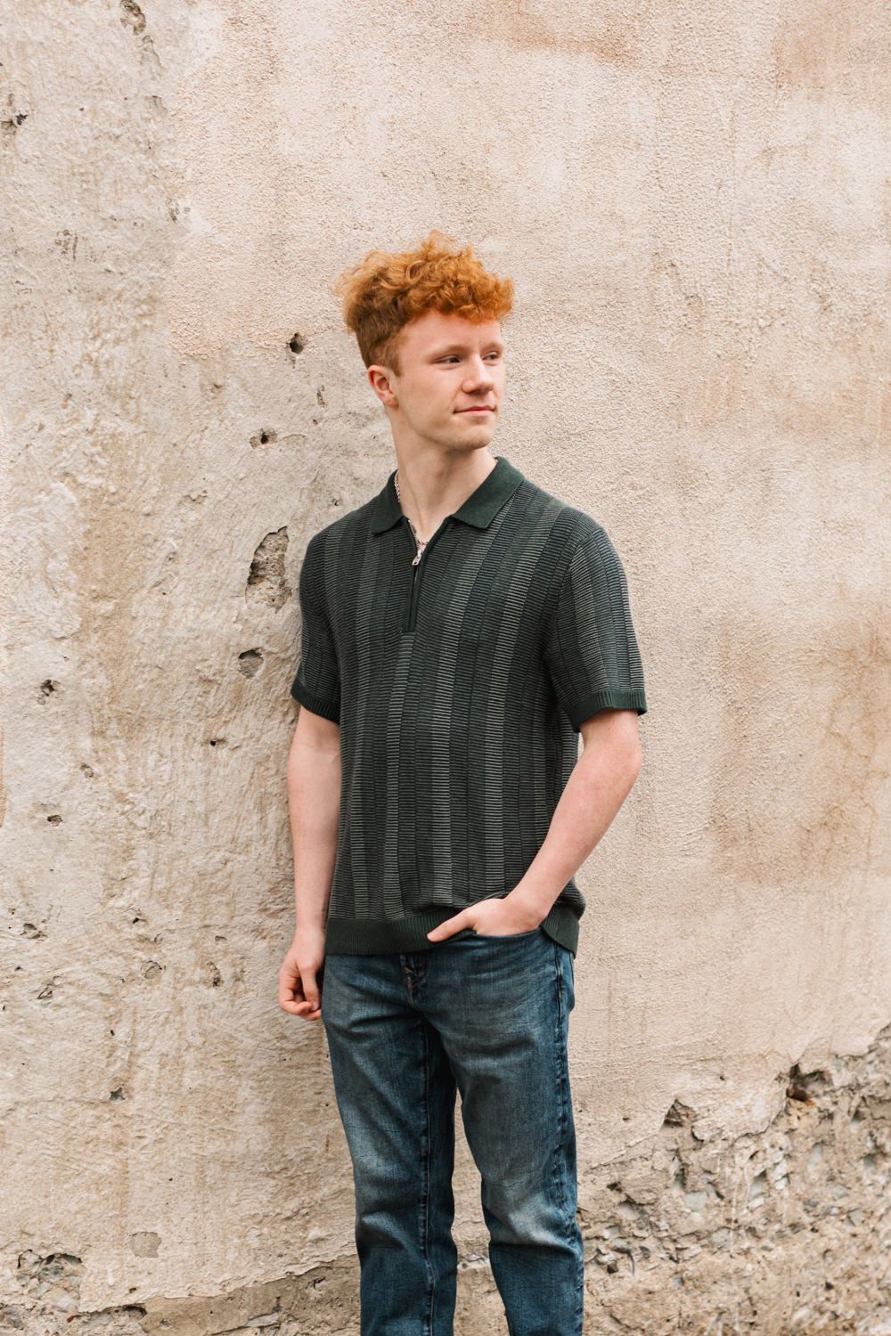 A series of casual outdoor portrait shots against a concrete wall in natural light.