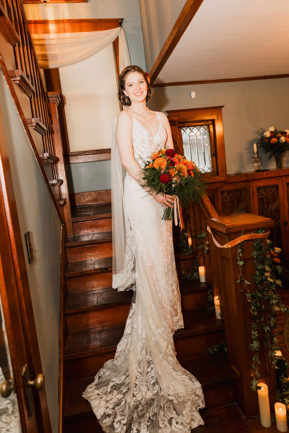 A sequence of elegant wedding dress photos showing lace details and romantic candlelit staircase setting.