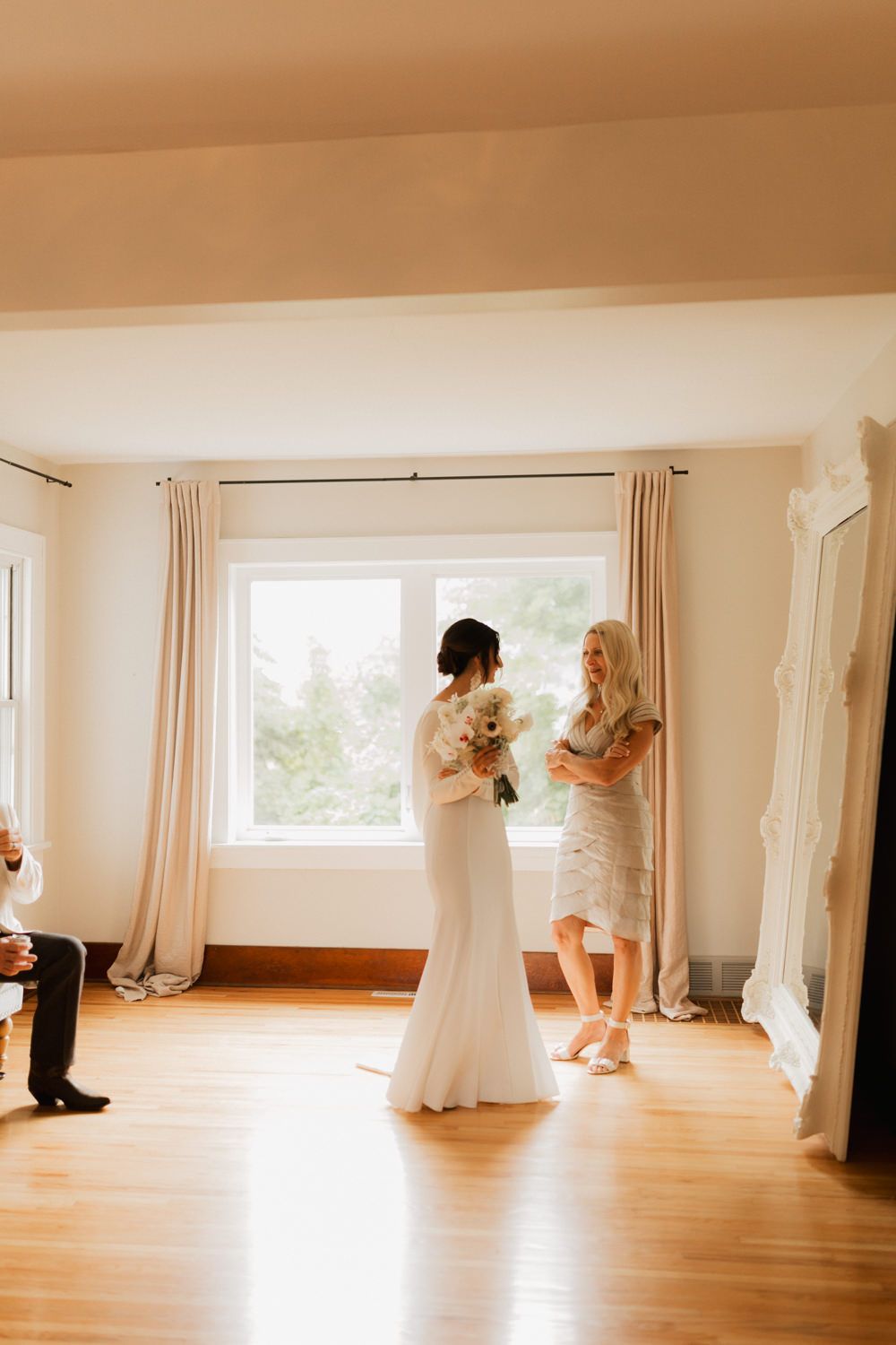 A sequence of wedding preparation moments captured in a bright sunlit room with hardwood floors and white curtains.