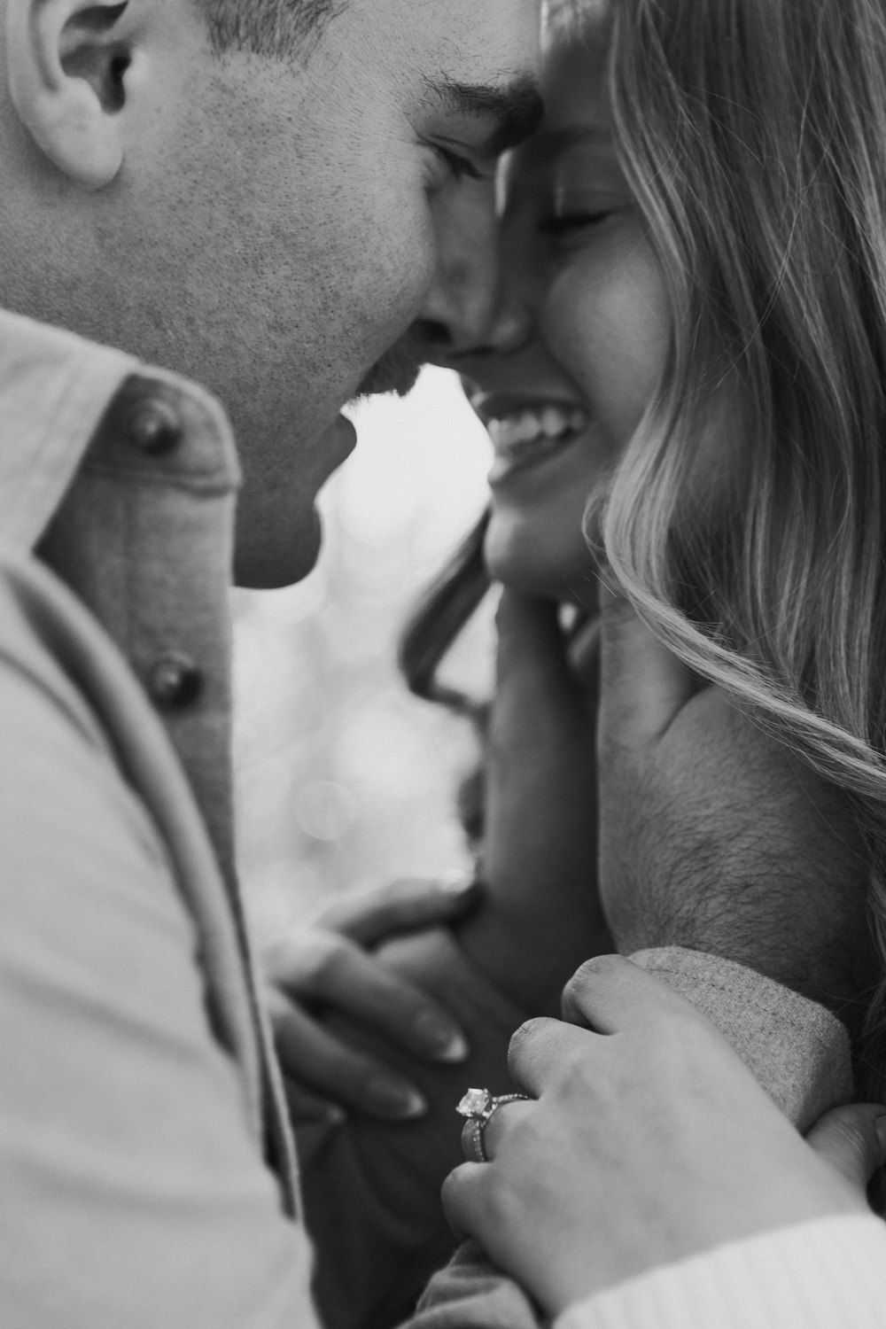Close-up black and white photo series showing intimate romantic moments between a couple.