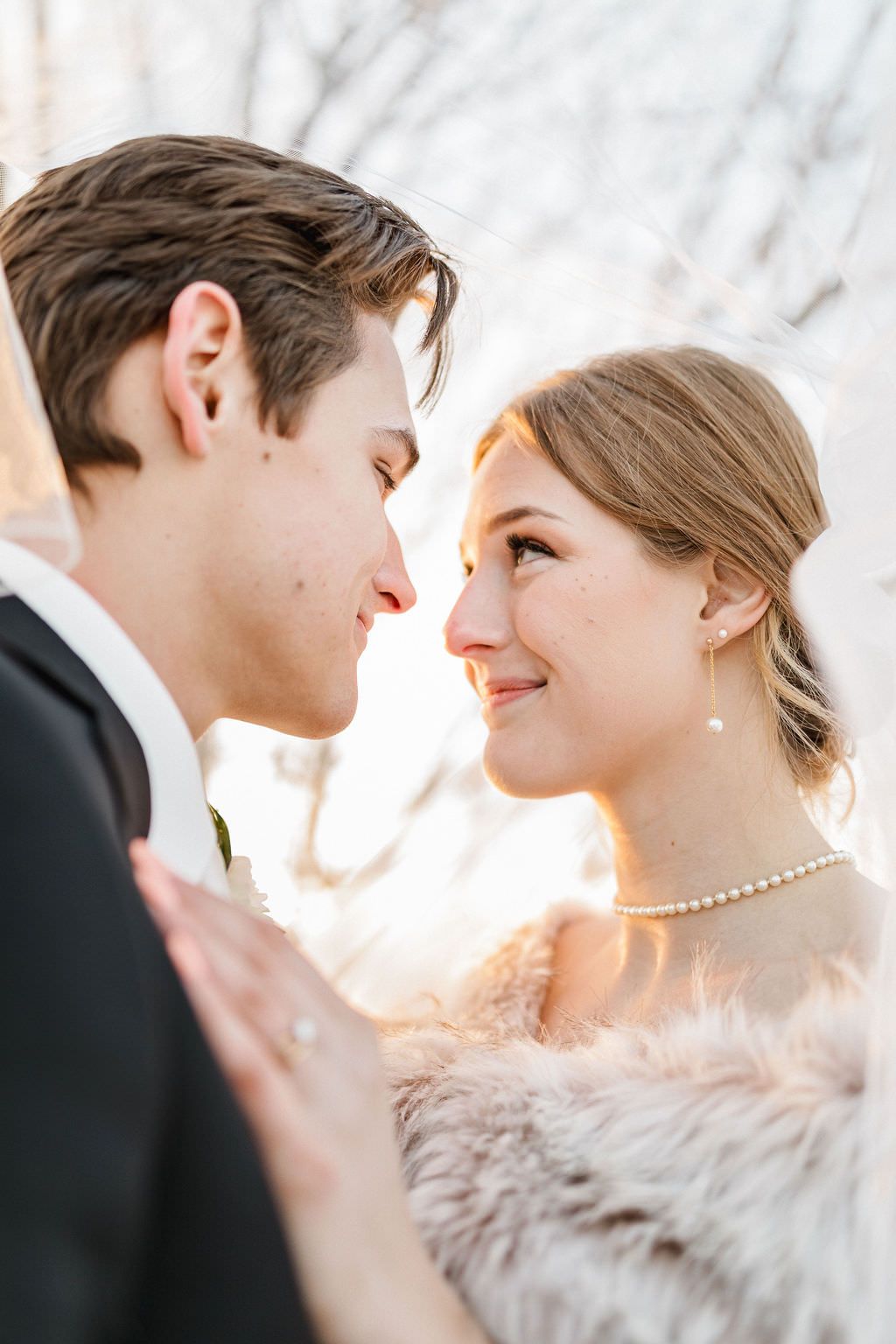 Romantic wedding portrait sequence showing tender moments between newlyweds at sunset.