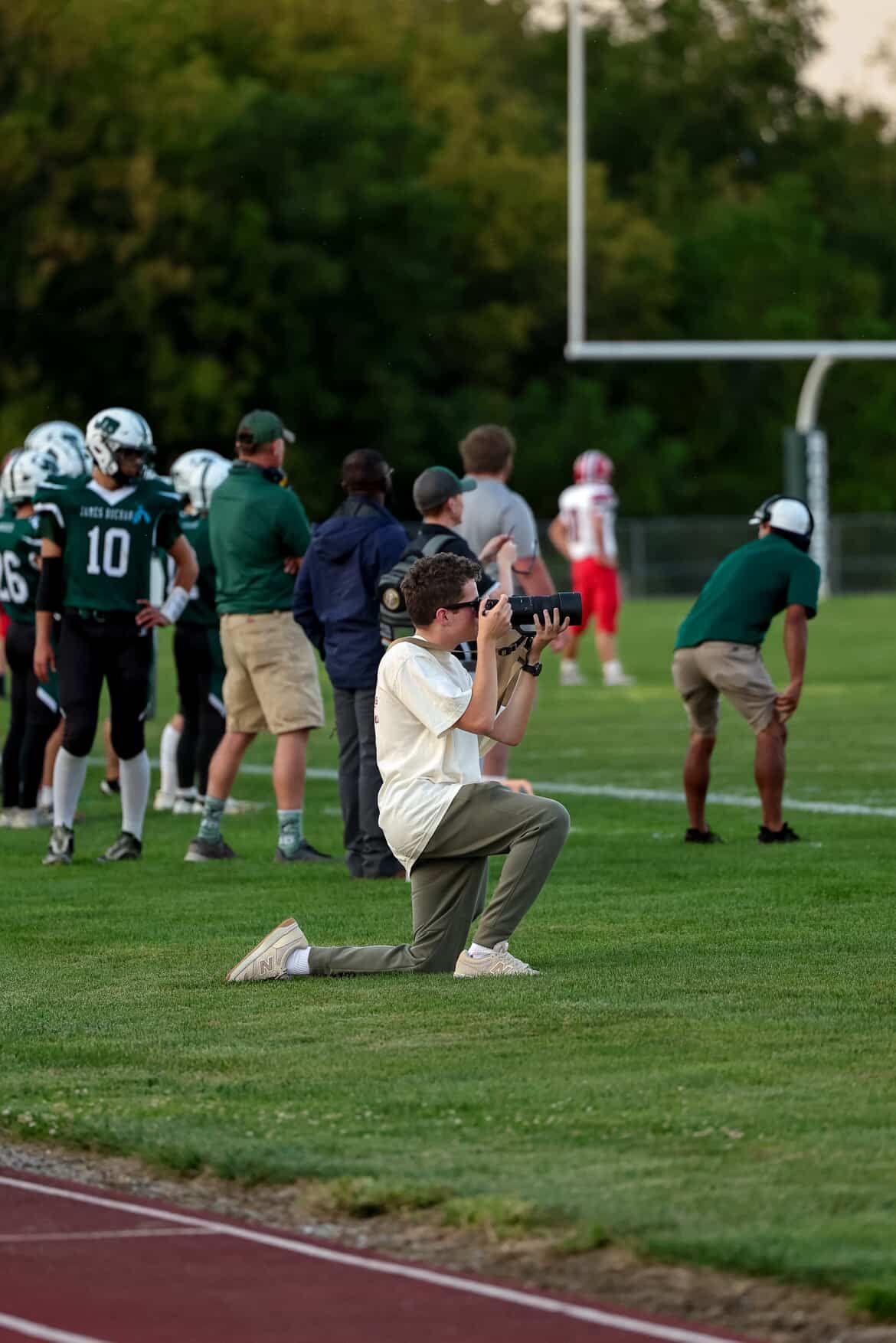 Me Photographing at a football game