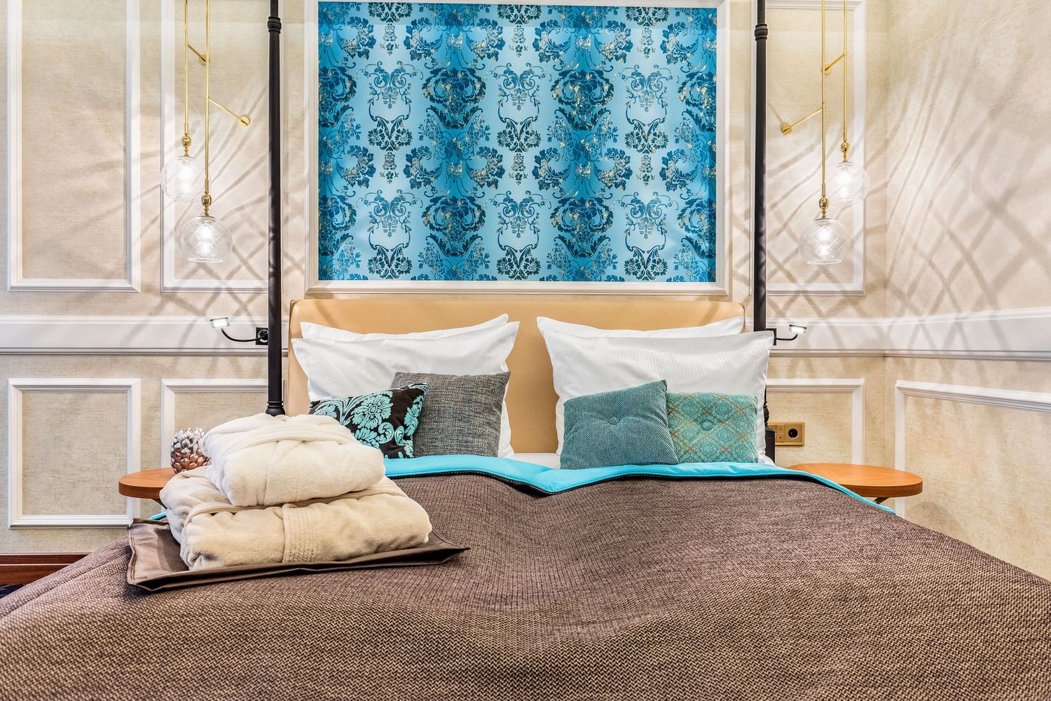 Contemporary bathroom design with blue damask wallpaper and elegant white fixtures creating a sophisticated ambiance.