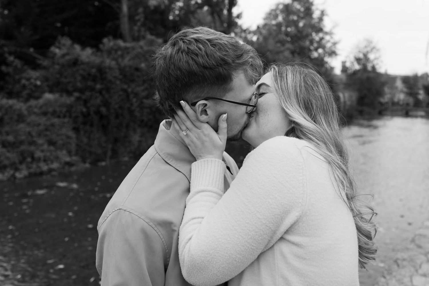 A romantic black and white photo series showing intimate moments between a couple.
