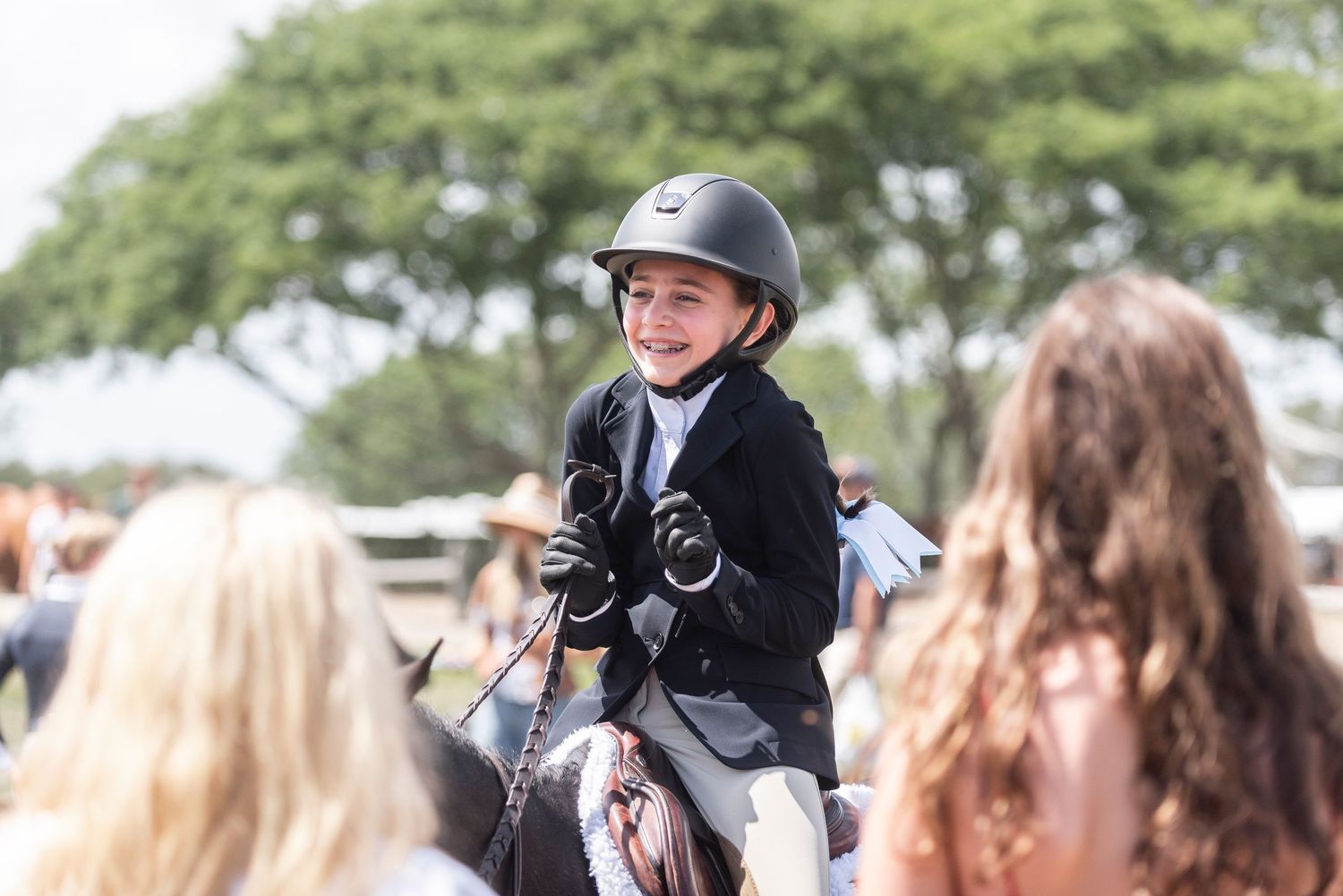 Hunter rider competing at The Hampton Classic Horse Show in Bridgehampton, NY