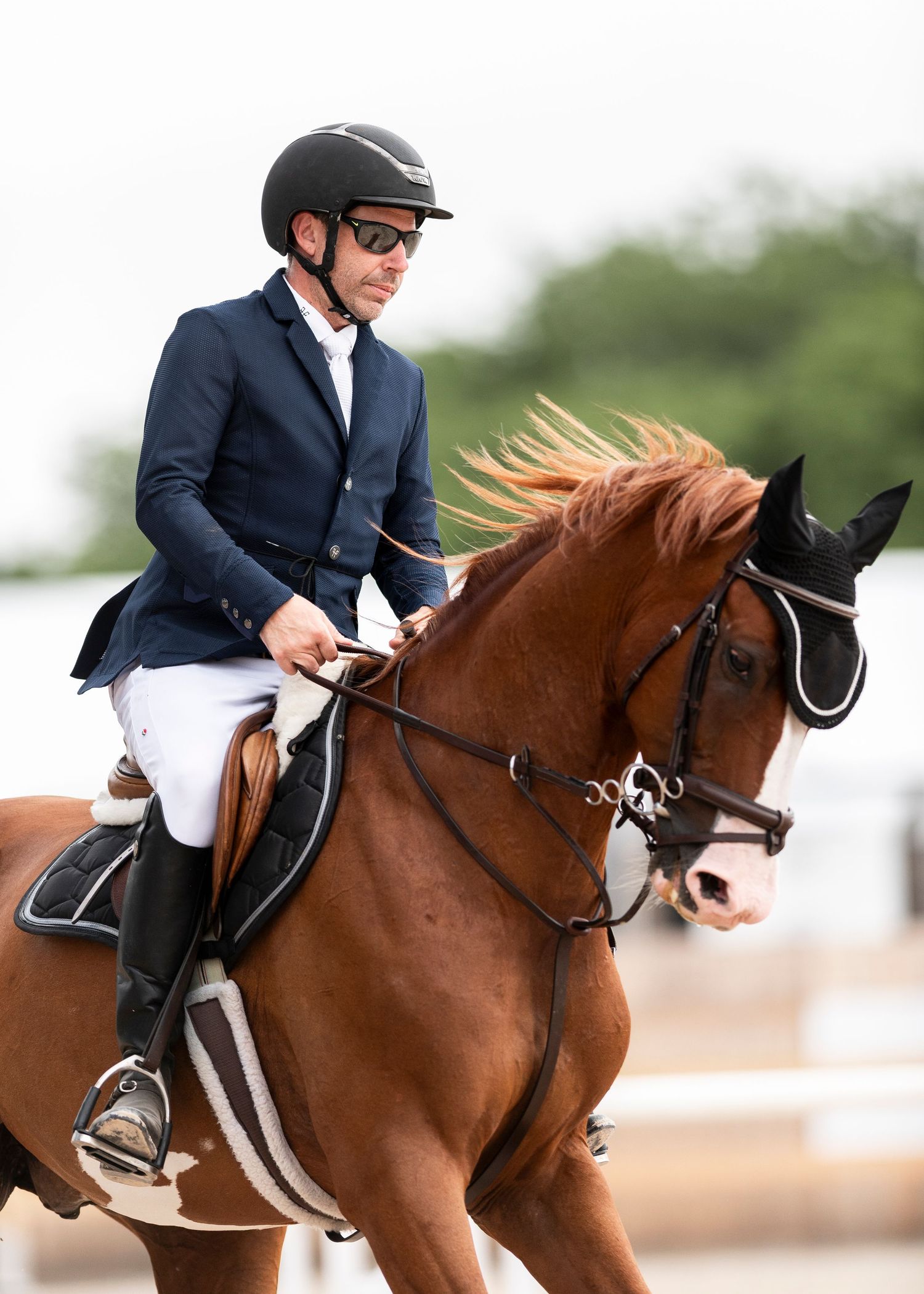 Jumper rider competing at The Hampton Classic Horse Show in Bridgehampton, NY
