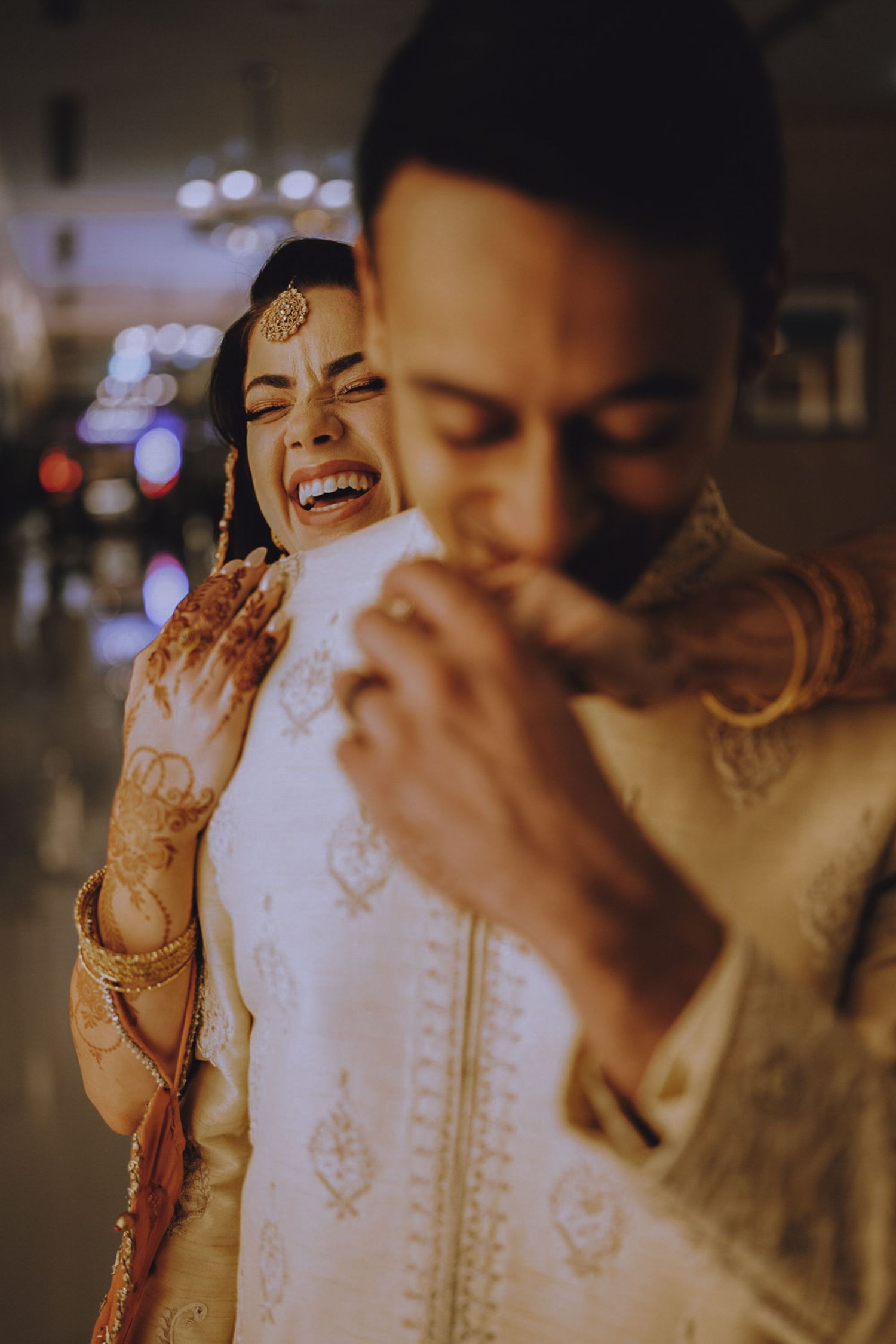 Beachside engagement portrait taken in Jumeirah, Dubai — waves, wind, and warm emotions all in one shot.