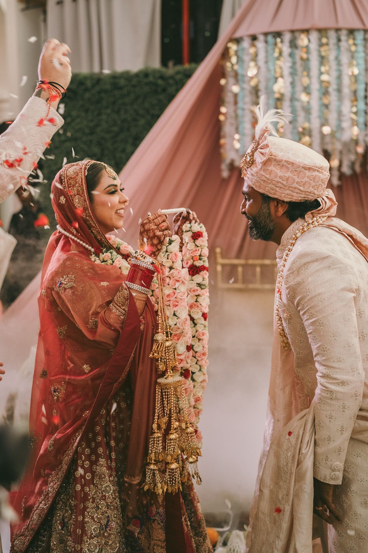 Heartfelt moment captured: siblings laughing in haldi turmeric ceremony, reflecting the deep love and tradition of South Asian weddings.