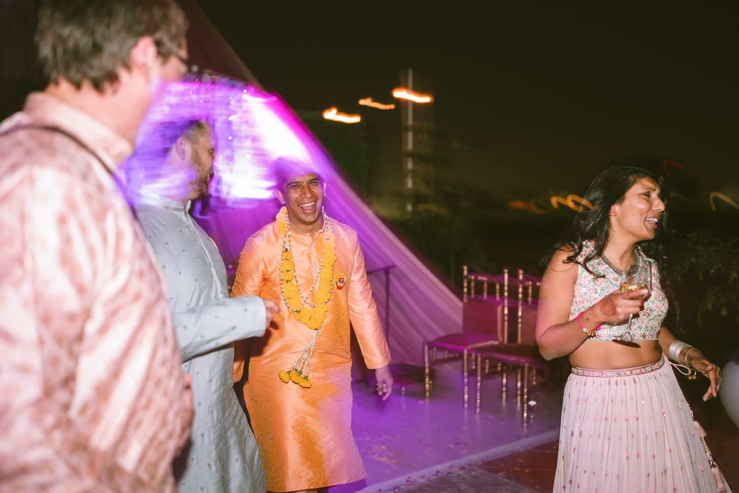 Groom friend are always having fun those moments are priceless for them and couple family