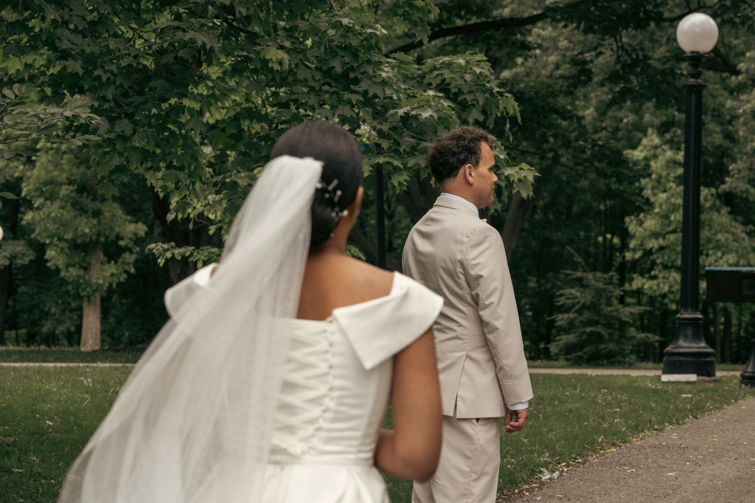 White wedding couple walking down the aisle as husband and wife, capturing their joyful expressions for the first look