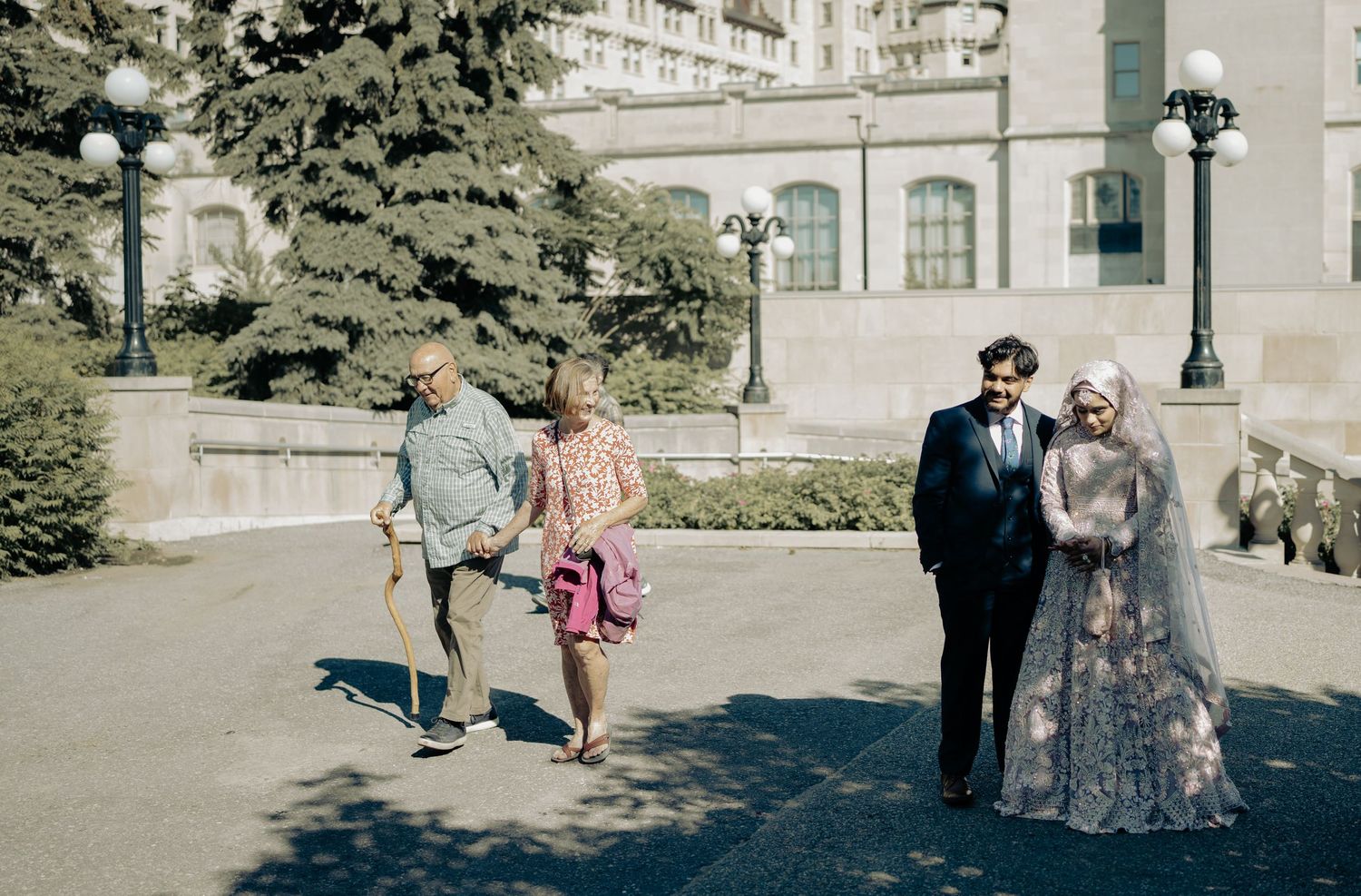 Heartfelt moment captured: uncle and aunt blessing the groom at the reception, reflecting the deep love and tradition of the wedding