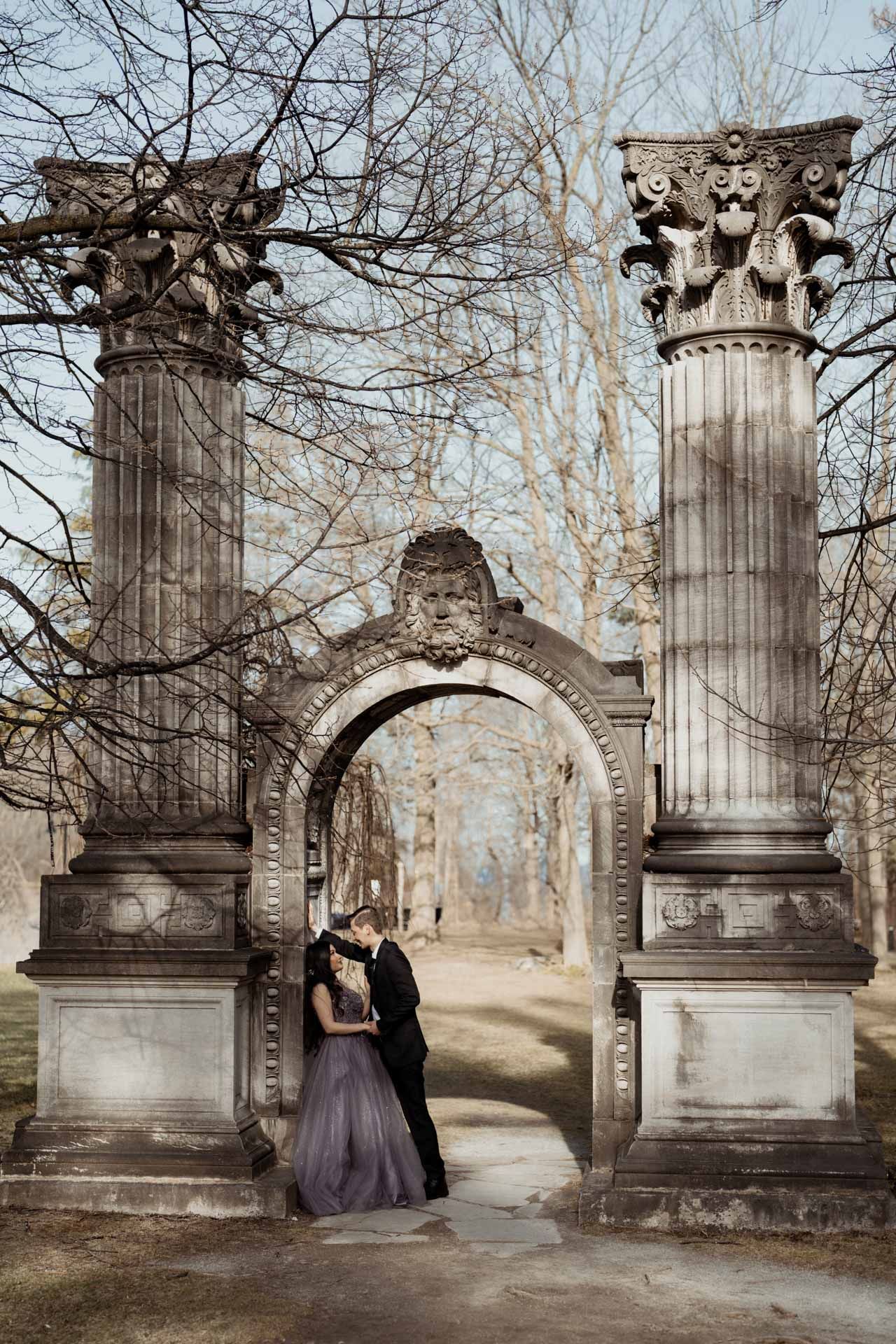 Engagement shoot at Guild Inn Estate Toronto, capturing the couple's love story in a lush garden setting with historic stone ruins.