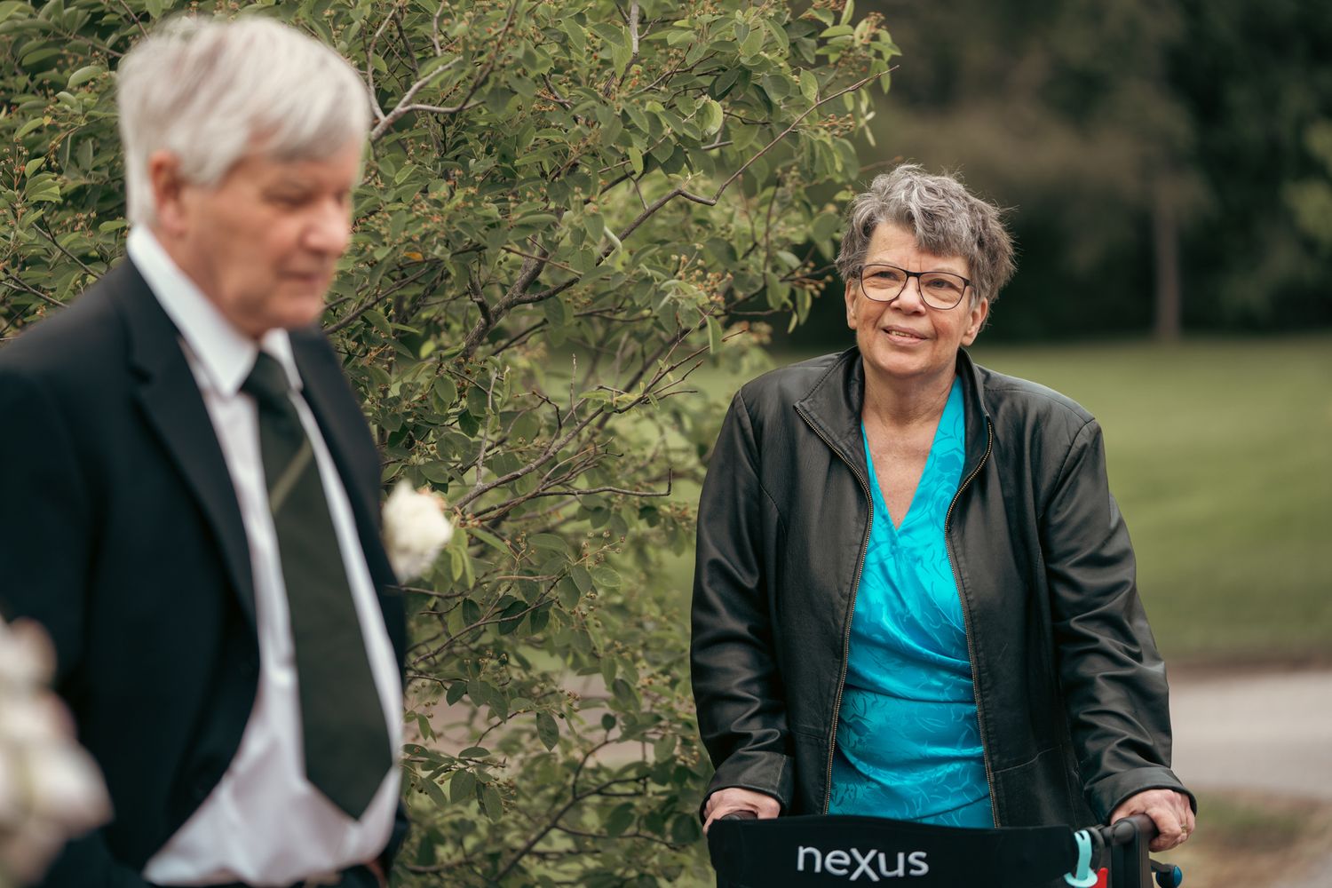 what a beautiful look groom's mother looked her husband during family photo shoot at ottawa