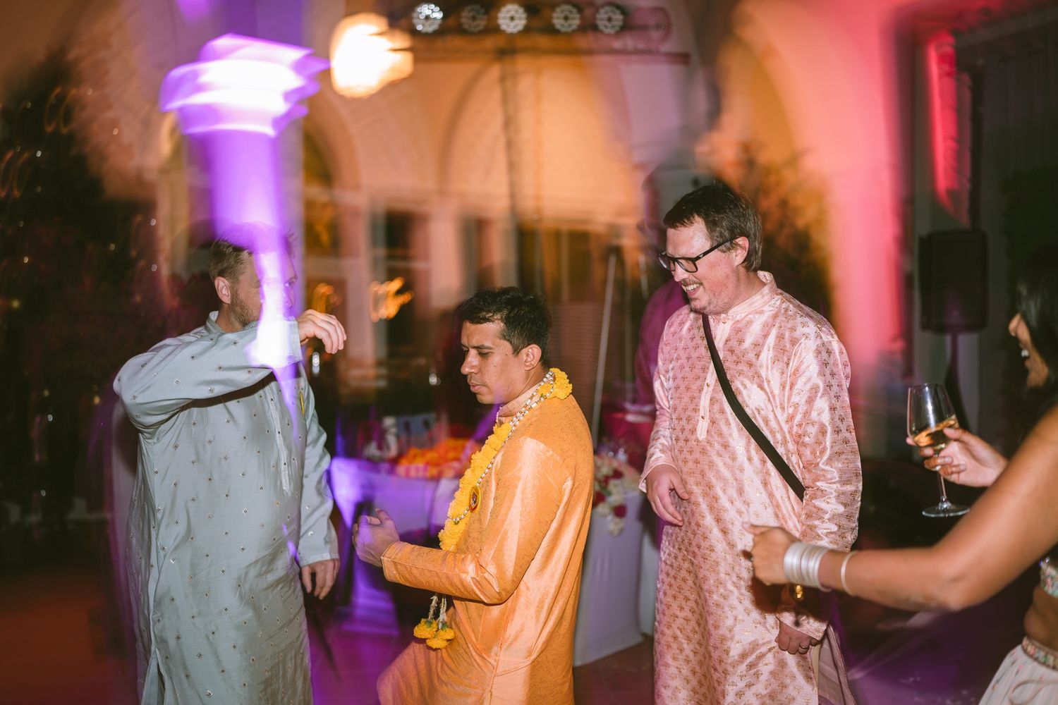 Heartfelt moment captured: siblings laughing in haldi turmeric ceremony, reflecting the deep love and tradition of  Asian weddings dance