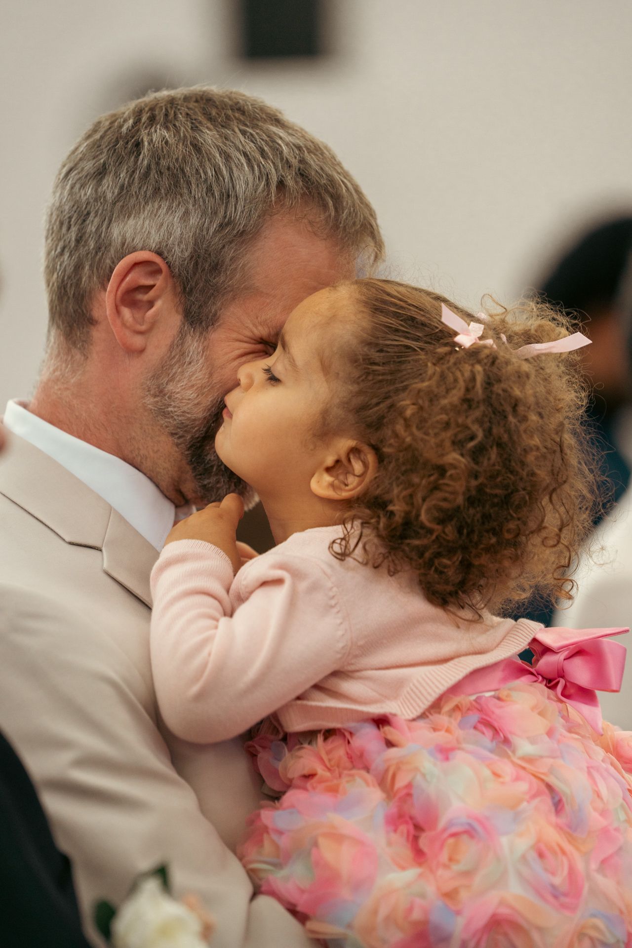 A lovely moment between father and daughters at the white wedding church - Ottawa