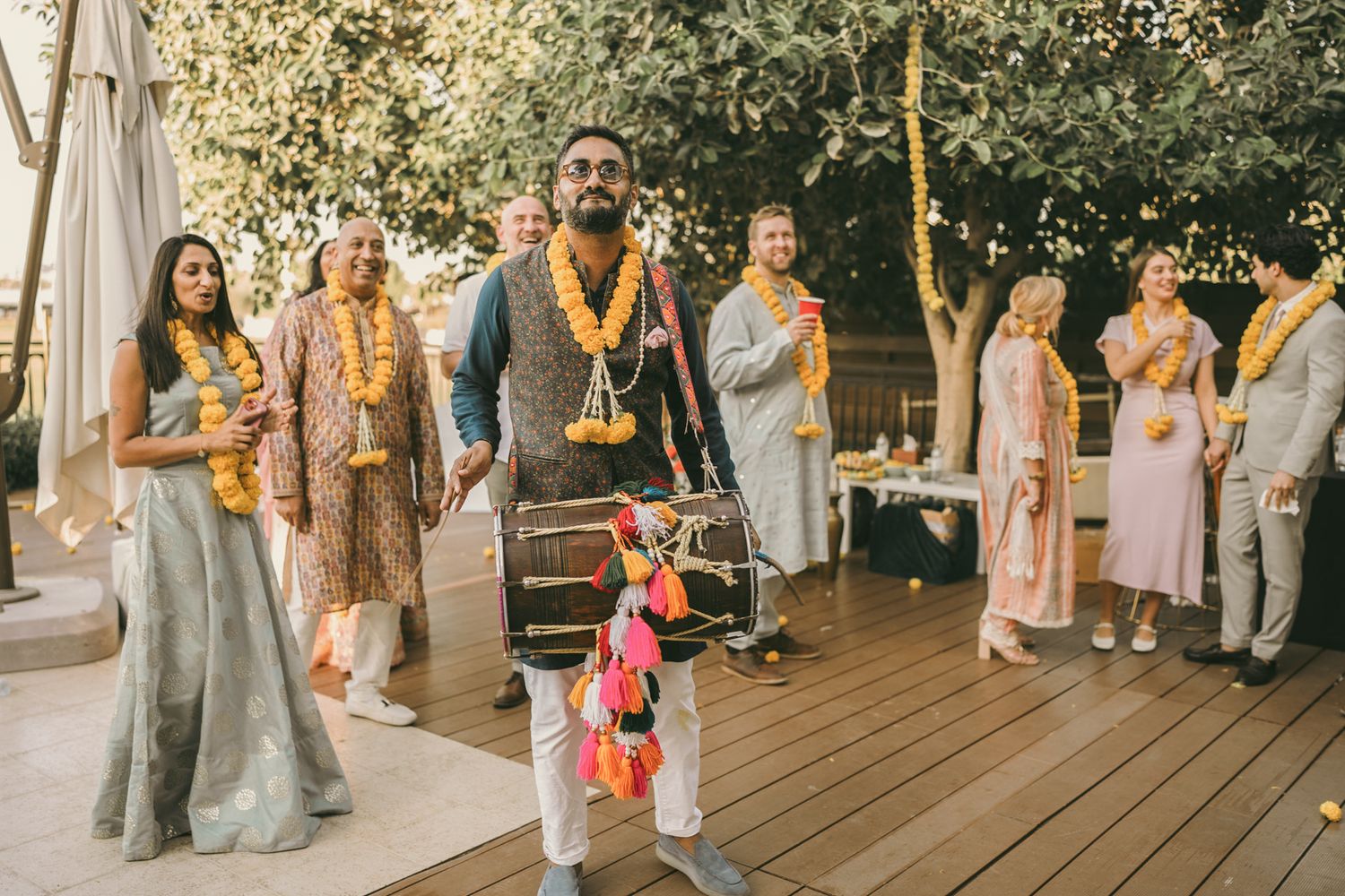 Heartfelt moment captured: elder giving traditional blessings during baraat, reflecting the deep love and tradition of South Asian weddings.