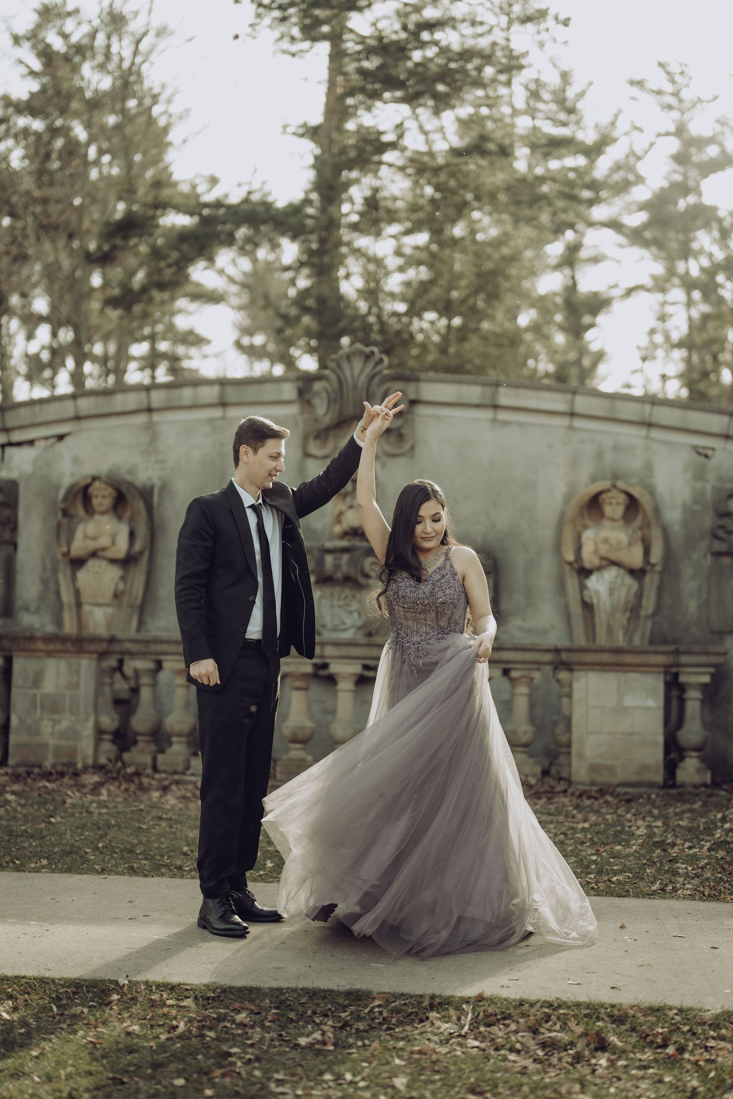 Cinematic portrait with bride and groom, holding hands in from of vintage wall at the heart of GTA Canada