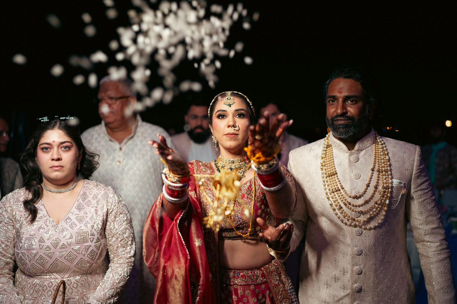 Heartfelt moment captured: father kissing bride’s forehead during rukhsati, reflecting the deep love and tradition of South Asian weddings.