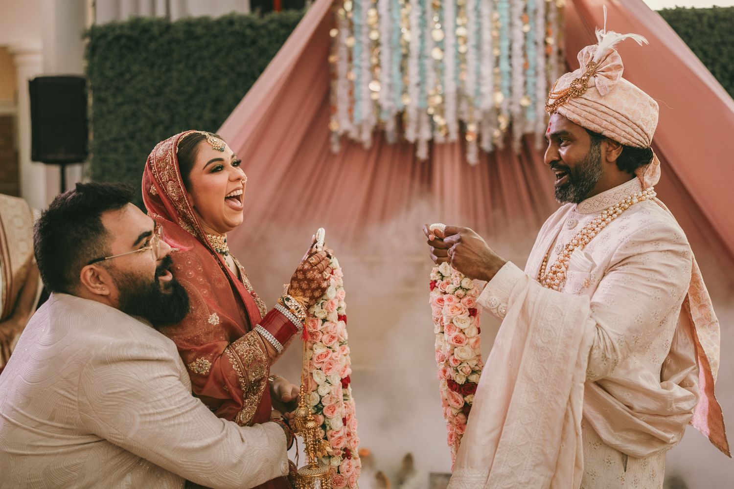 Heartfelt moment captured: bride and her brothe holding hands before the pooja, reflecting the deep love and tradition of Asian weddings