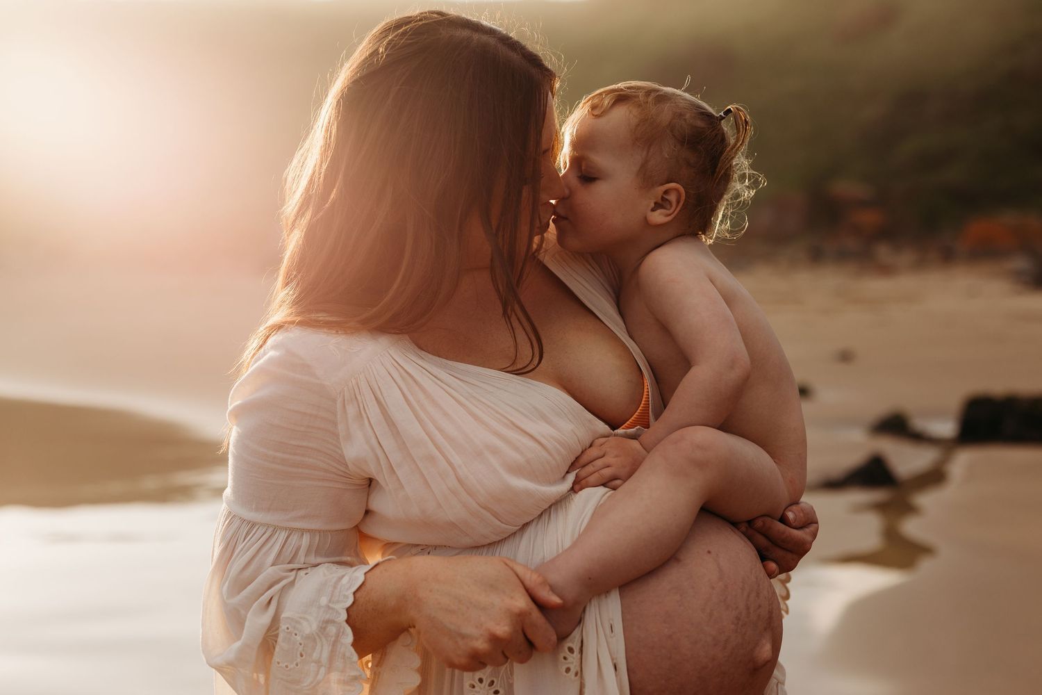 Pregnant Mum embracing her toddler adelaide maternity and family photographer, Raised by Water Photography