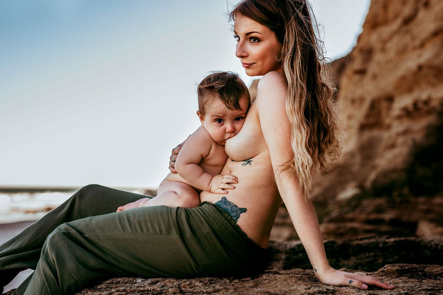 Tender maternity and motherhood photo of mum breastfeeding baby – South Australia