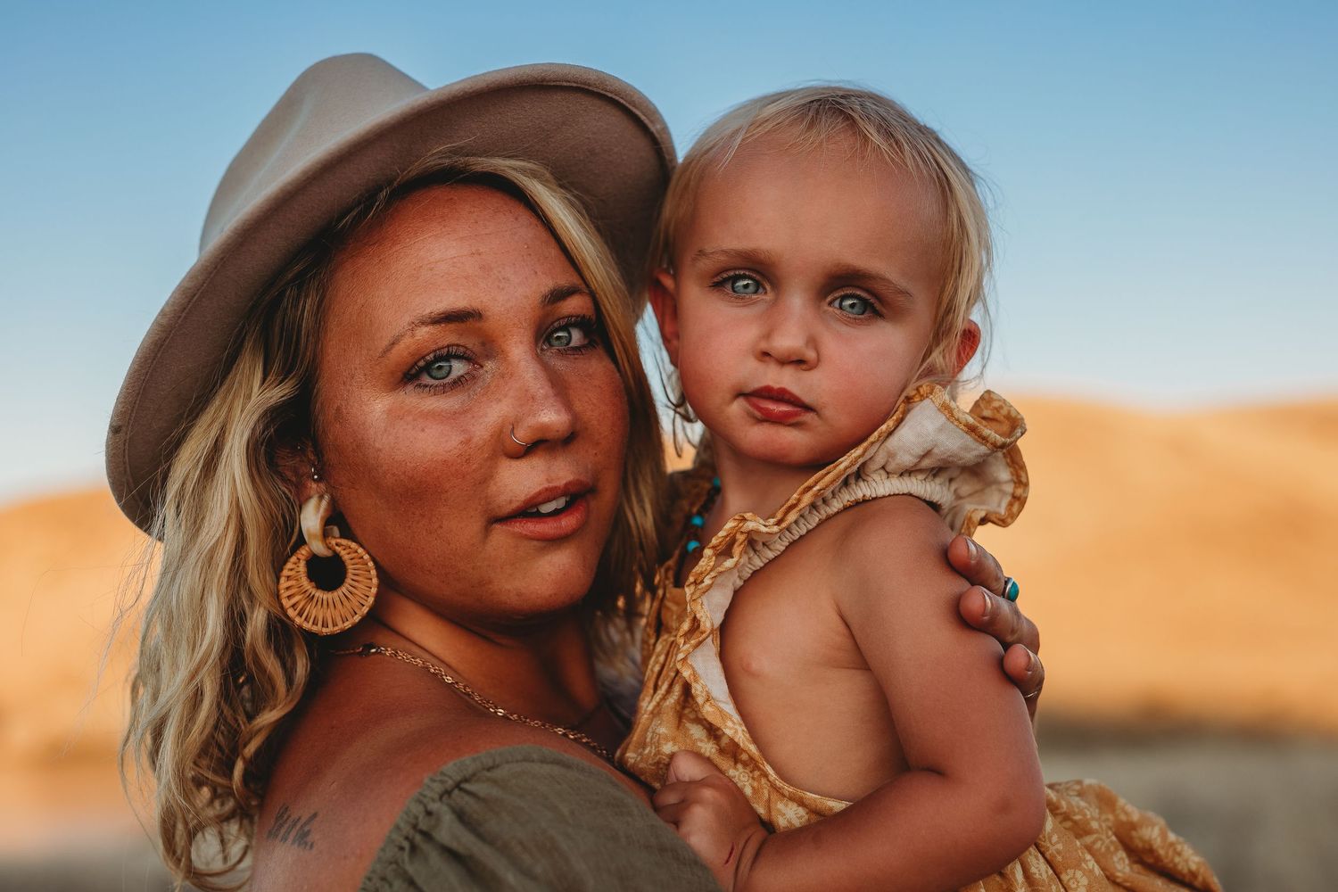 Close-up portrait of mother and daughter sharing a tender moment, soft natural light, Adelaide, South Australia