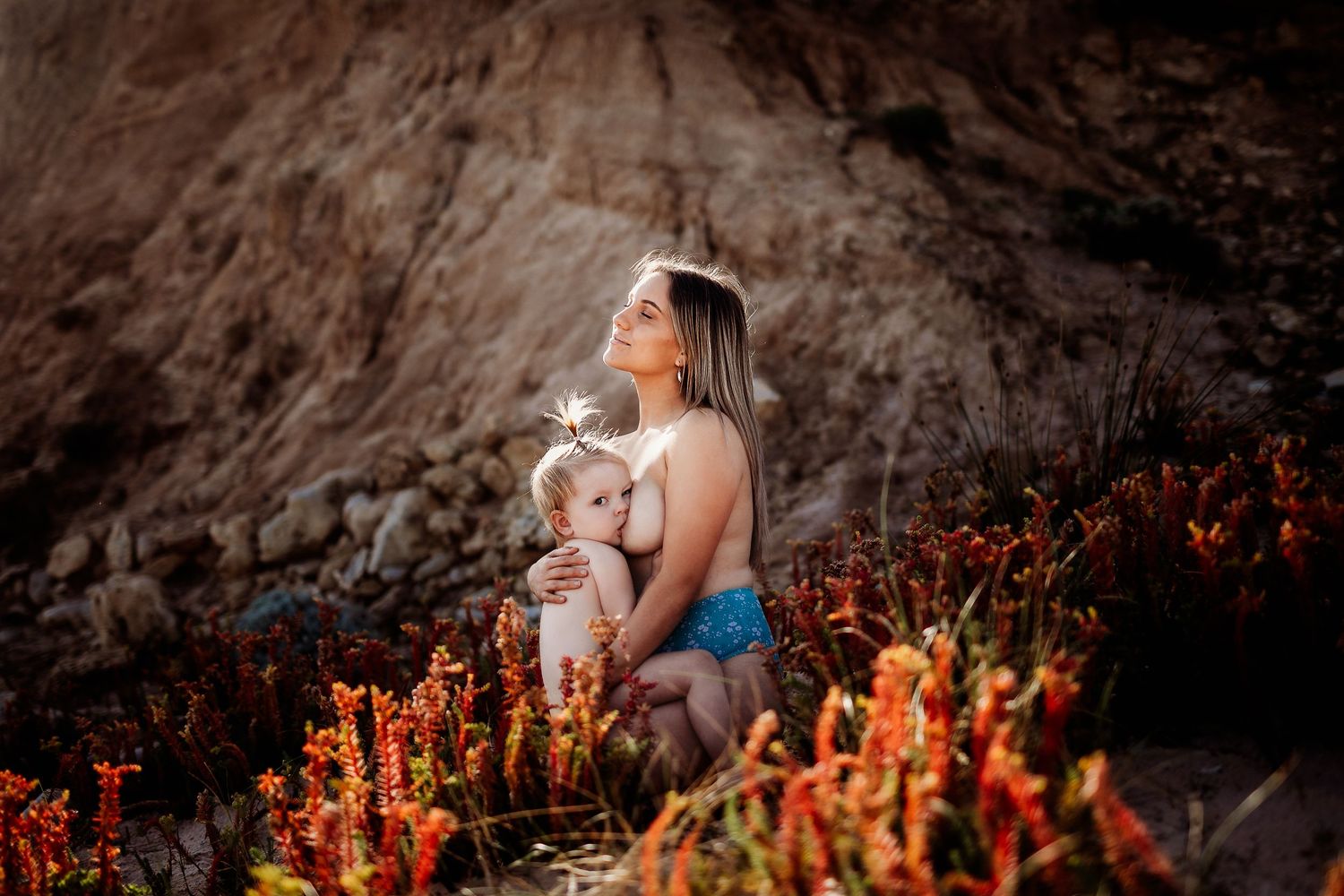 Candid breastfeeding moment between mother and baby – Adelaide lifestyle session