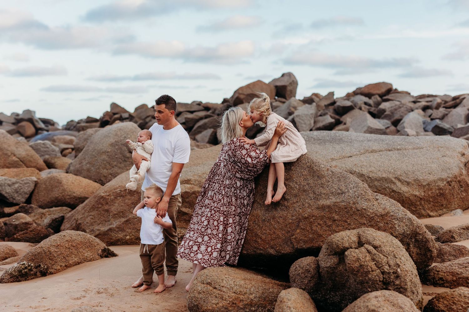 Natural family photo on rocks and the beach in Adelaide, South Australia.  Adelaide family lifestyle photographer