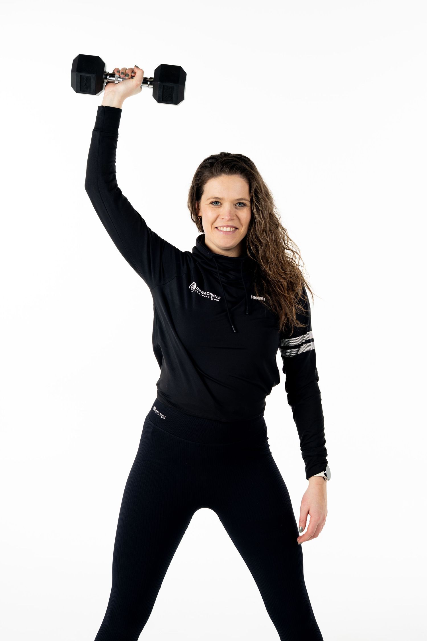 Fitness sequence showing dumbbell exercises in black athletic wear against white backdrop.