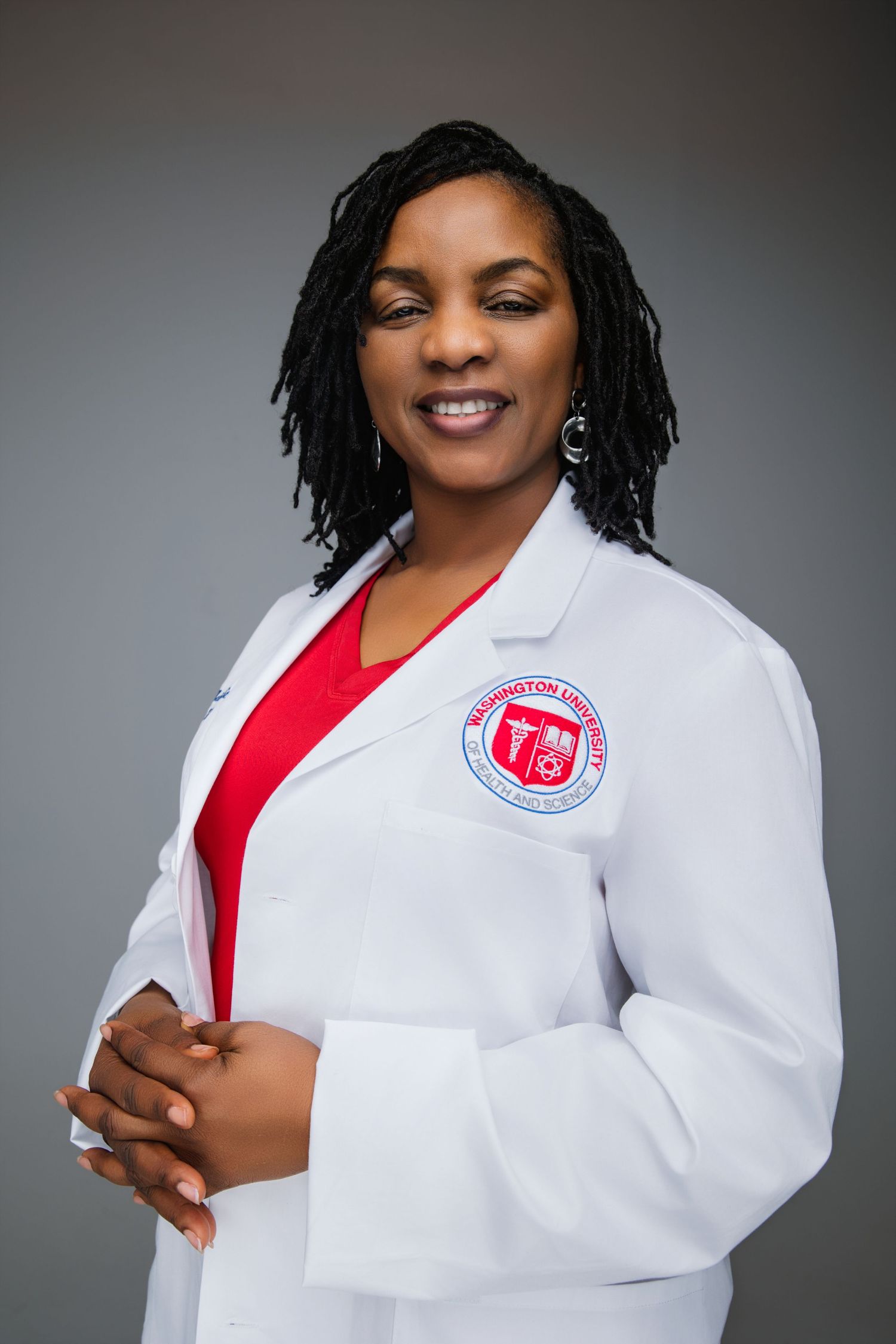 Head shot of Dr. Massaley pictured in her white coat.