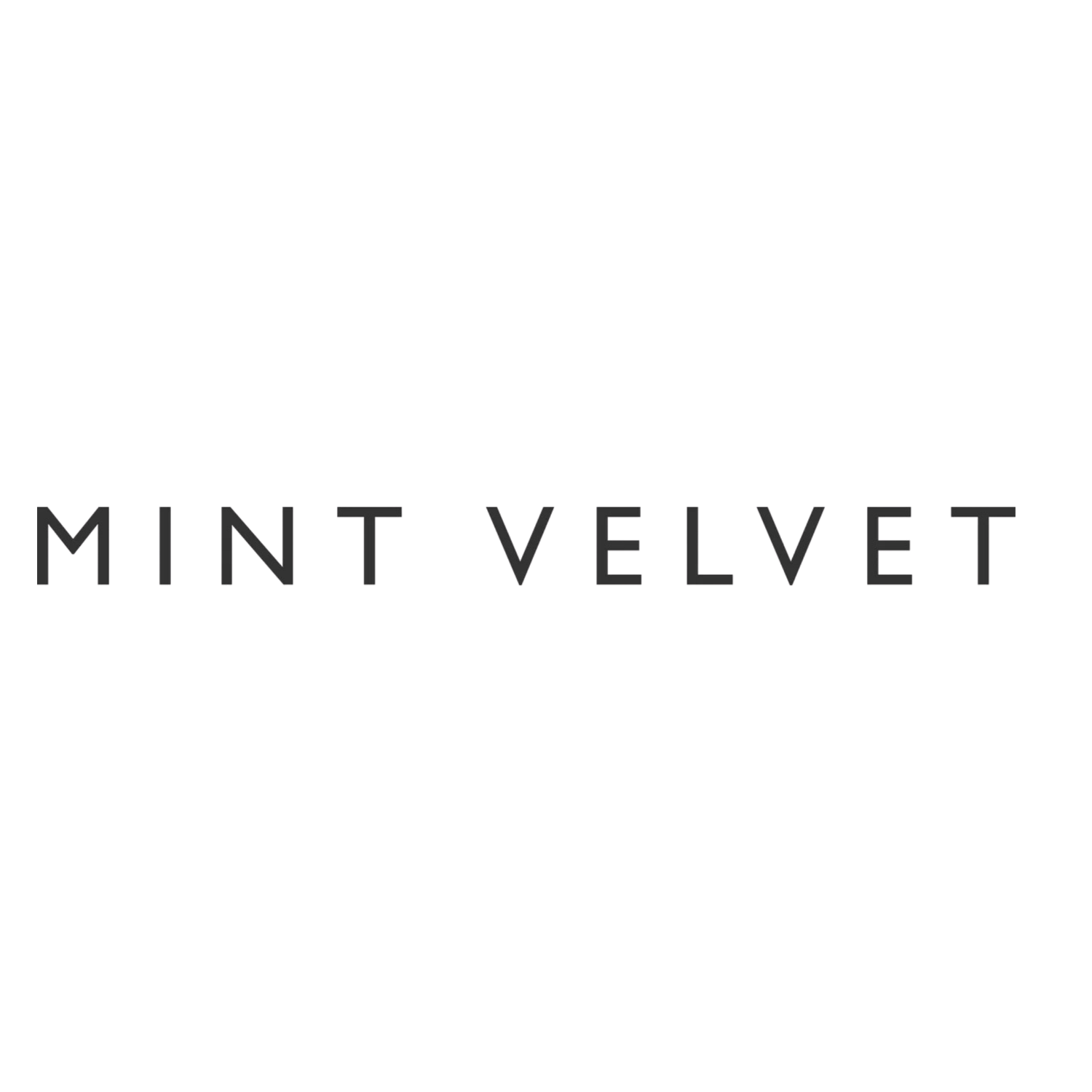 Mint Velvet minimalist logo featuring the brand name in dark grey spaced capital letters on a white background.