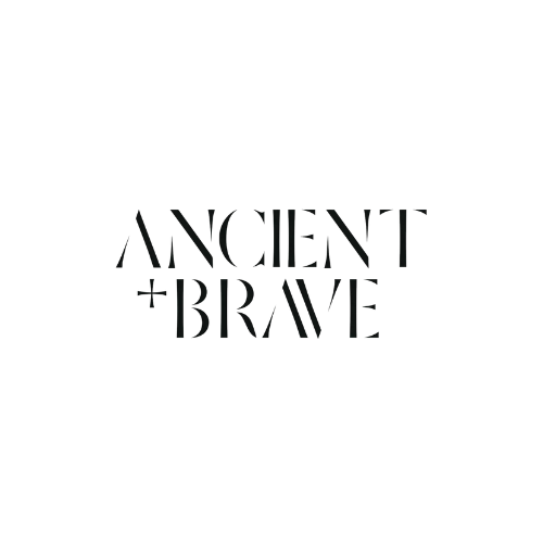 Elegant black and white typography logo design for Ancient + Brave with modern serif lettering.