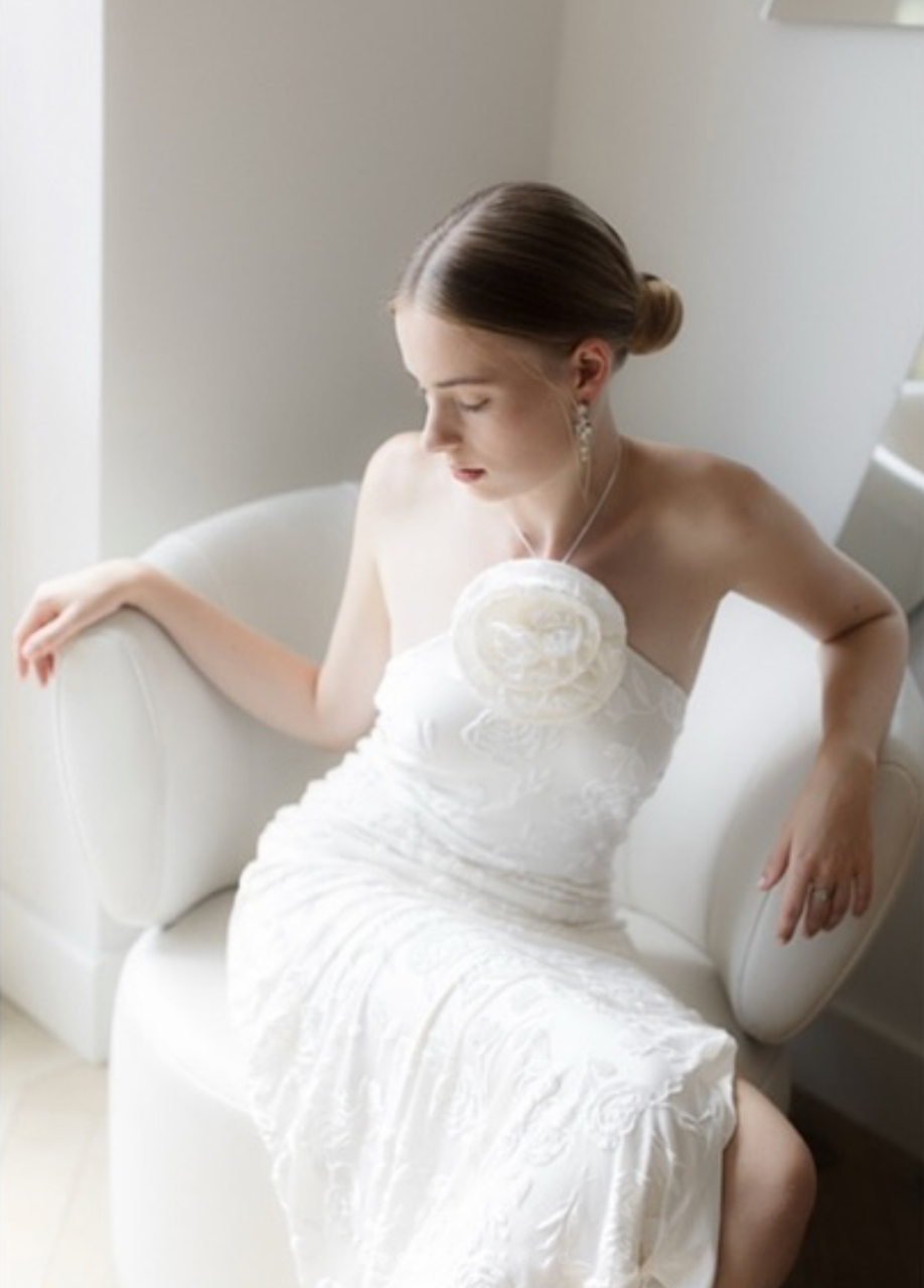 Ethereal bridal portraits showing white lace wedding dress details in soft natural light.