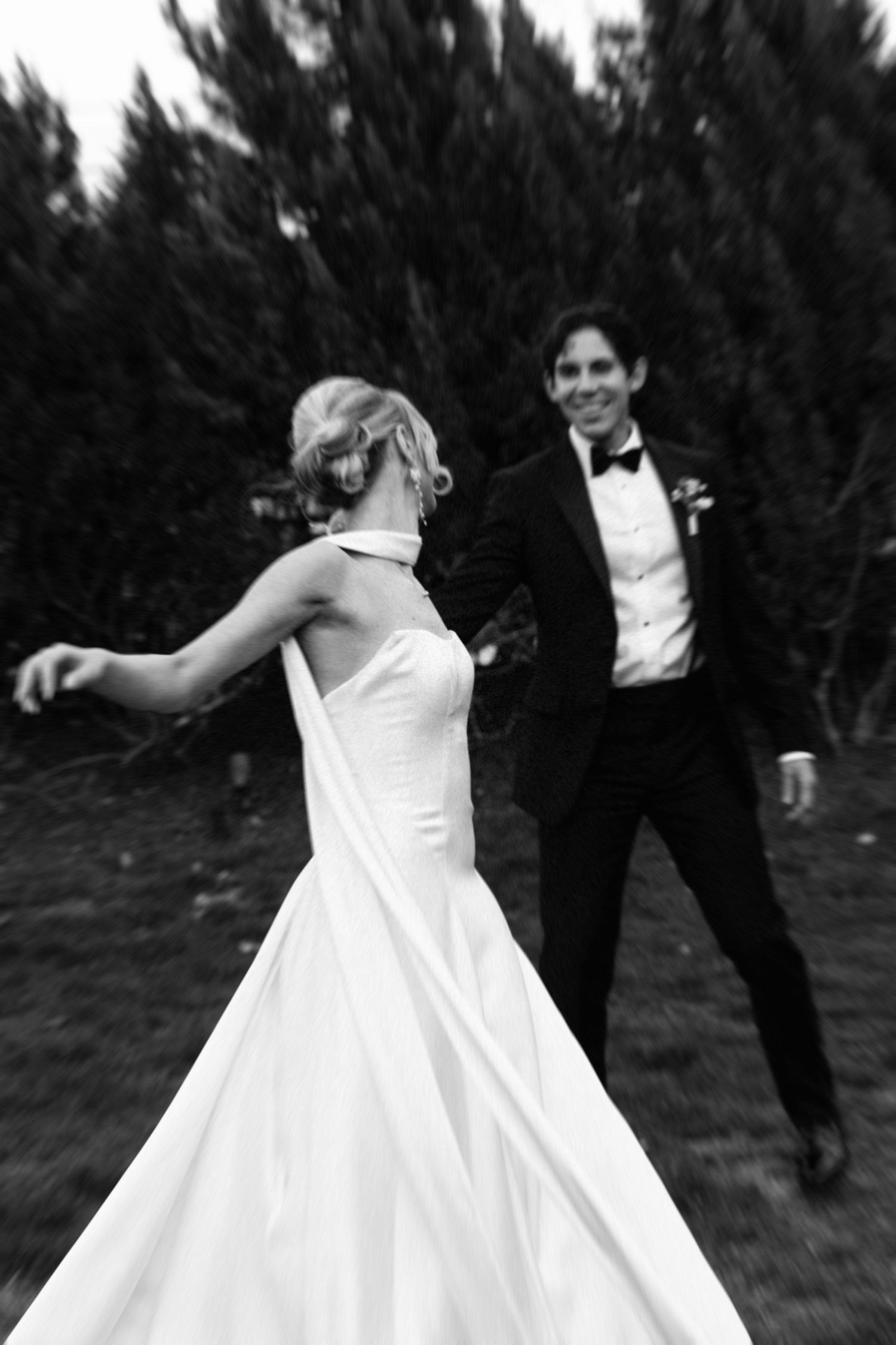 A photo sequence shows a bride in a flowing white dress twirling and dancing outdoors with dark trees in Nashville