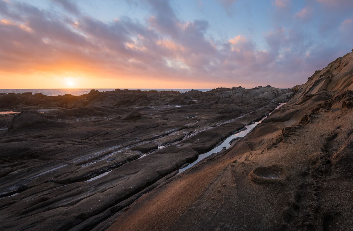 Dramatic sunset over the sandstone coast of Northern California.