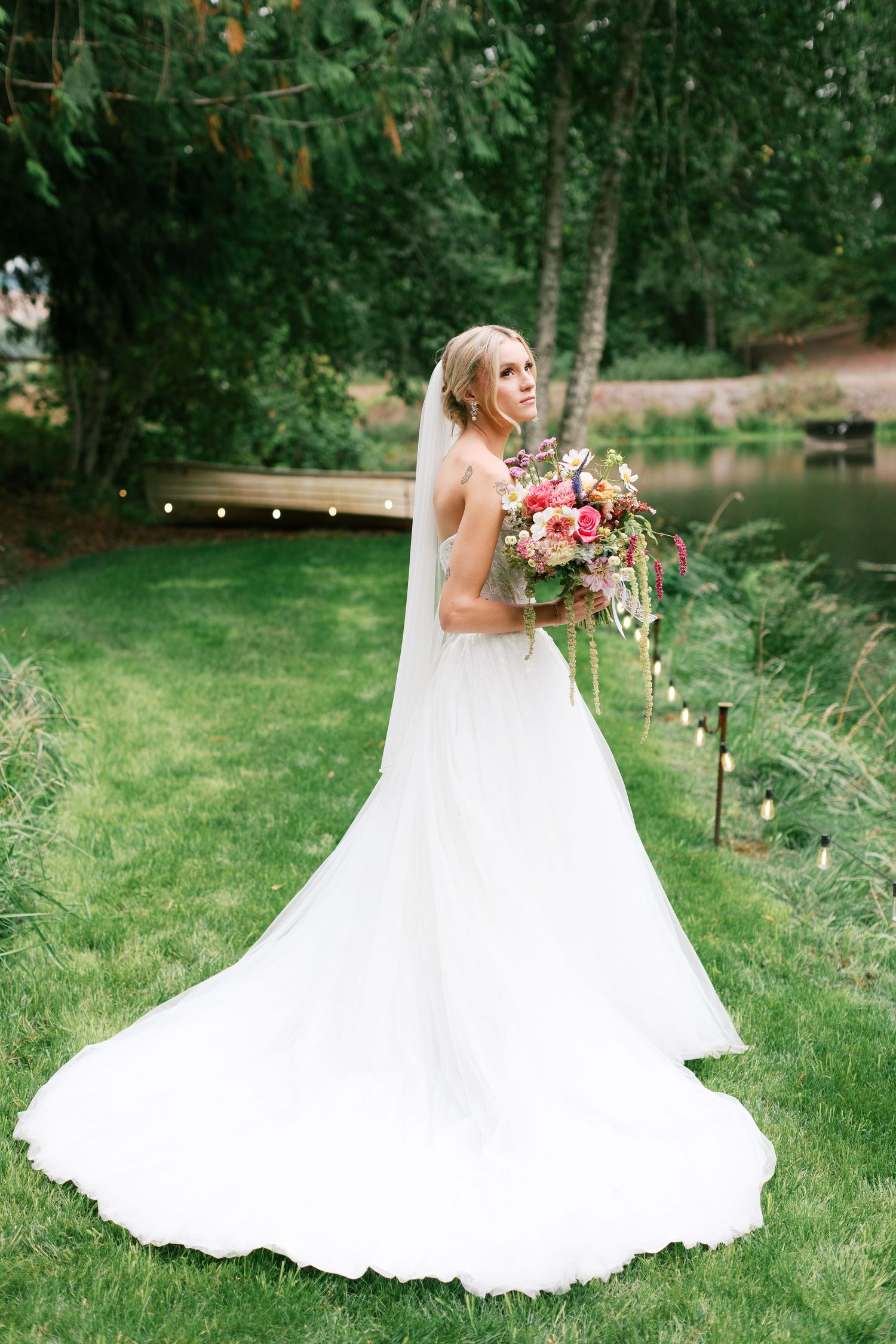 White wedding dress portrait in garden setting with Adrianna Elizabeth Photography.