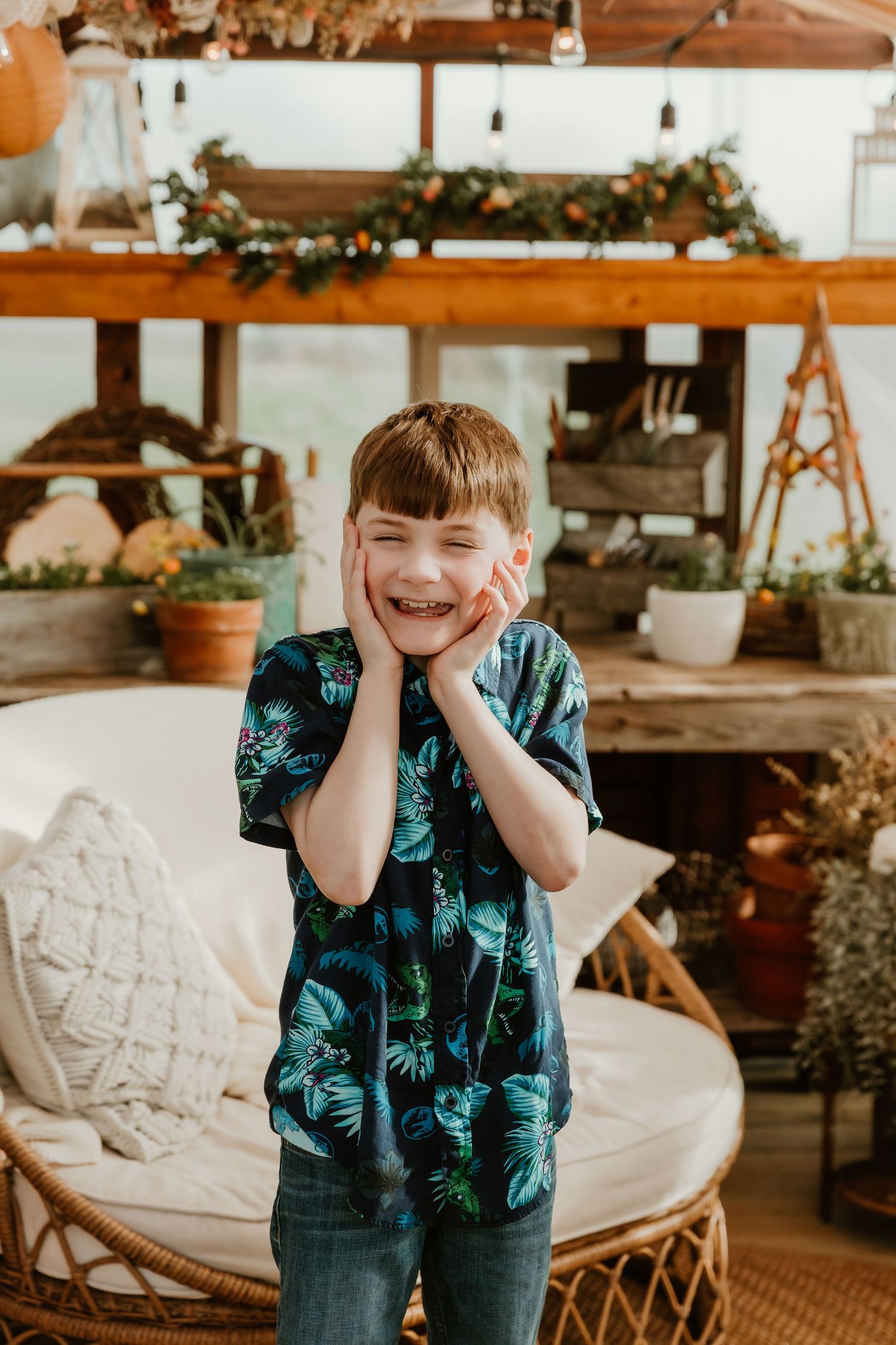 Child cheeses holding his face for a sweet moment captured by central il photographer
