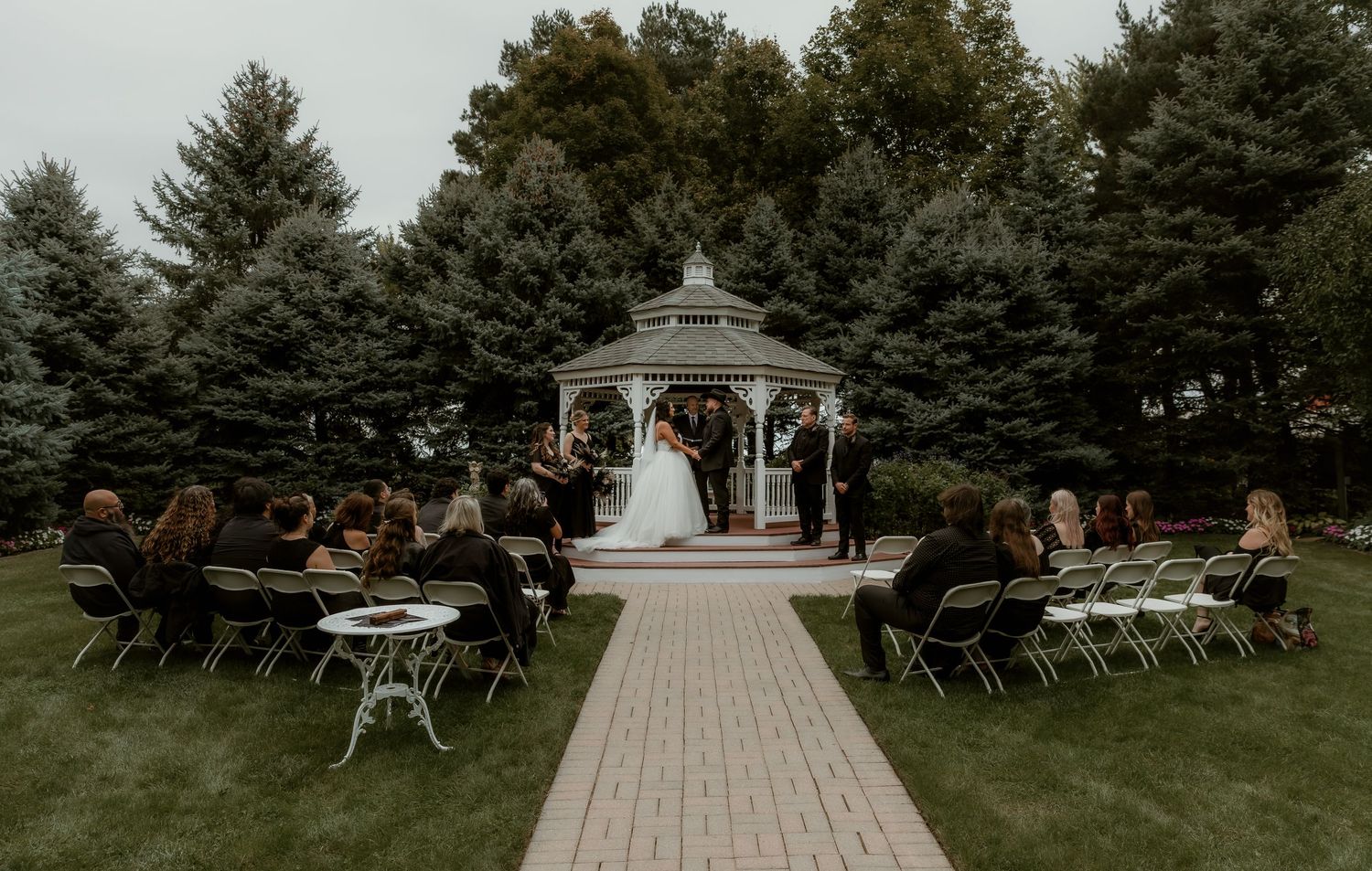 Chapel in the Pines in Sycamore, IL wedding ceremony documented by Illinois wedding photographer