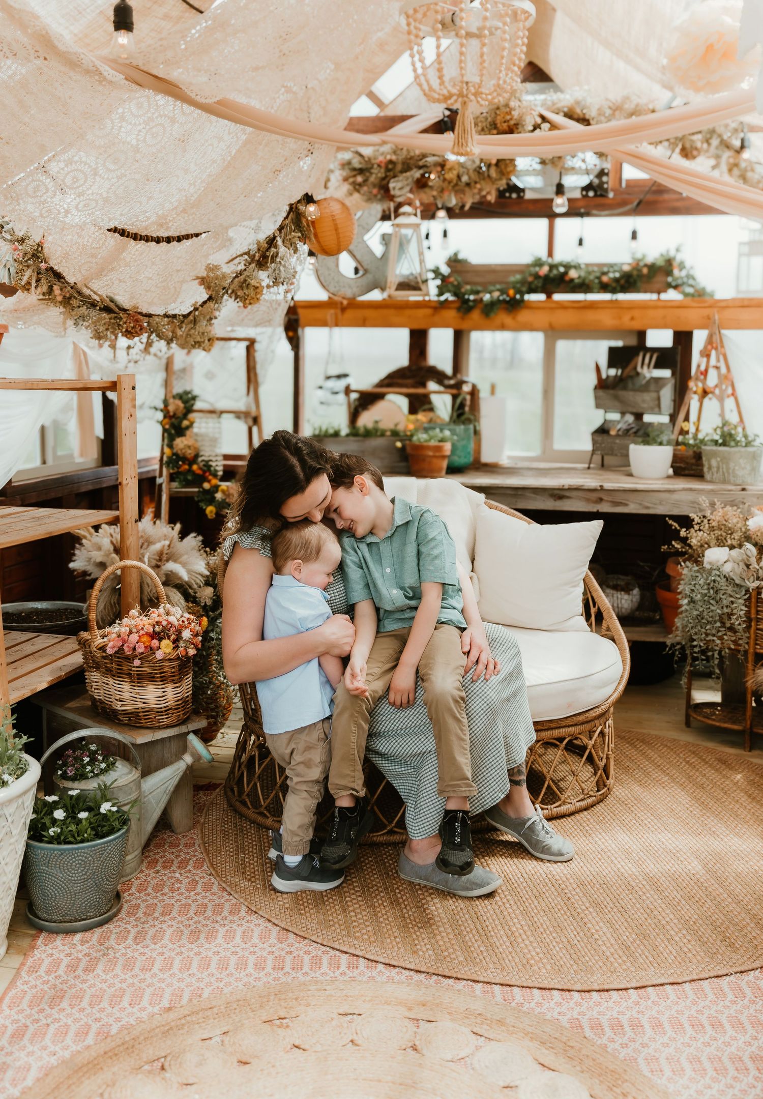 Mother holding her children during an emotional moment captured by central illinois photographer